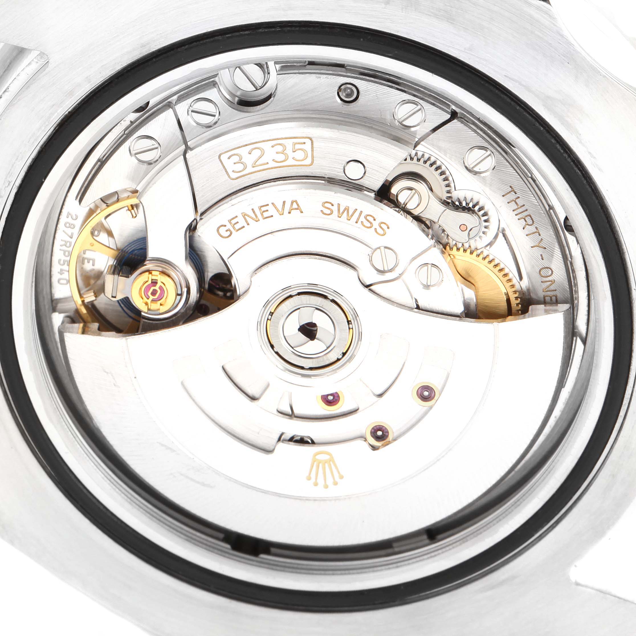 The image shows an internal view of the Rolex Sea-Dweller 126600 Men
s Stainless Steel Black Dial 126600 Men
s Stainless Steel Black Dial
s Calibre 3235 automatic movement, with gears and the rotor prominently visible.