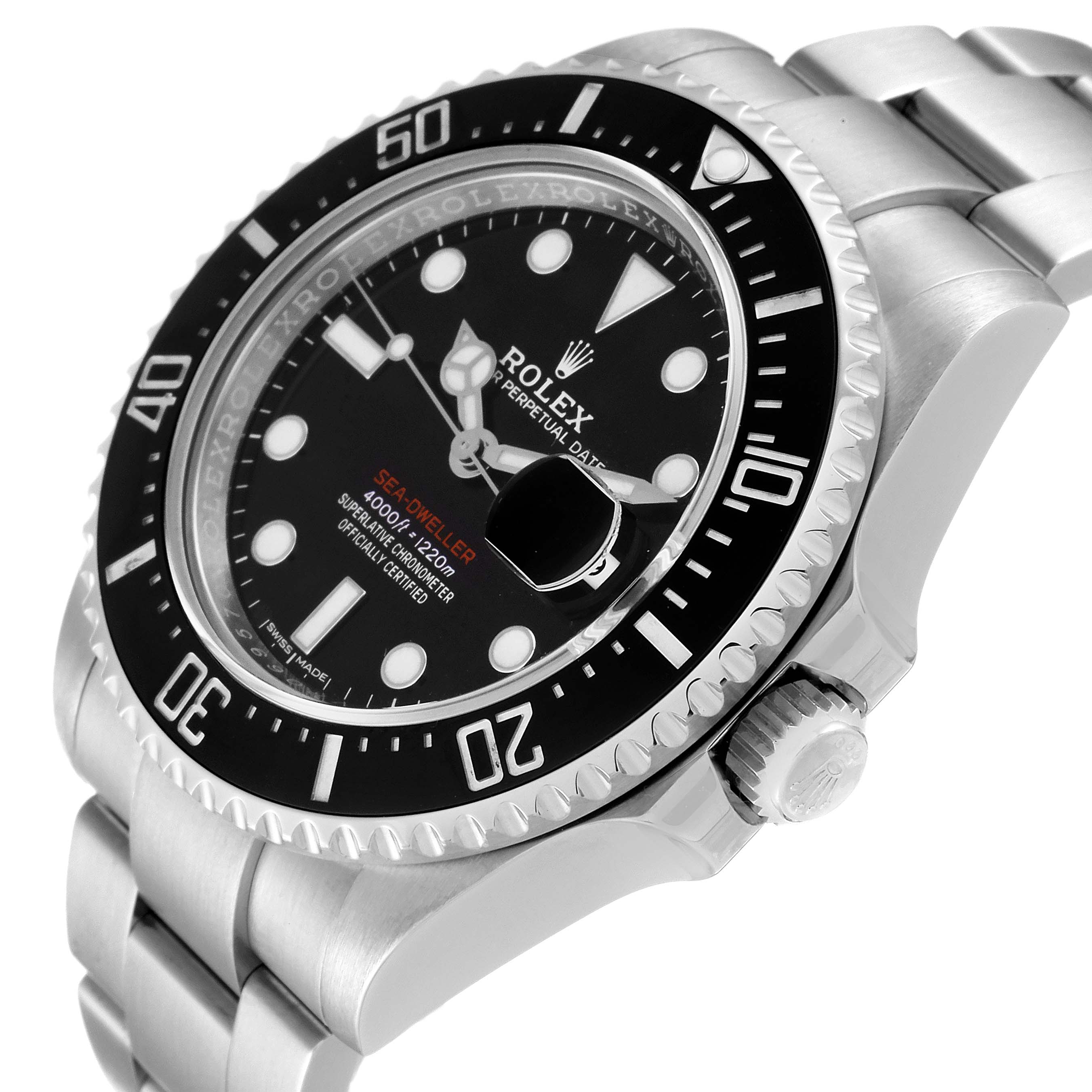 The image shows a close-up angle of the Rolex Sea-Dweller 126600 Men
s Stainless Steel Black Dial 126600 Men
s Stainless Steel Black Dial watch face, bezel, crown, and bracelet.