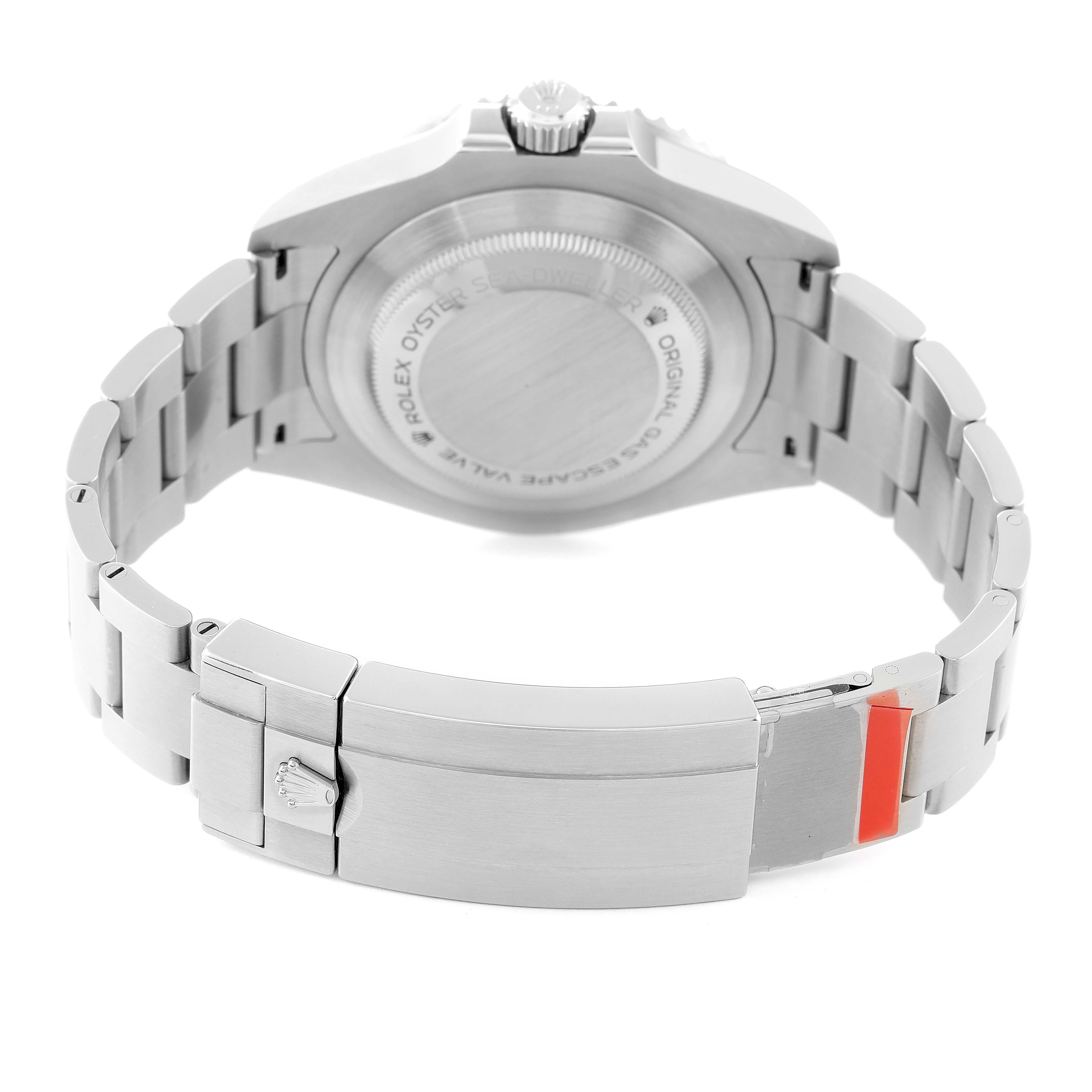 The image shows the back view of a Rolex Sea-Dweller 126600 Men's Stainless Steel Black Dial 126600 Men's Stainless Steel Black Dial watch, highlighting the case back and bracelet clasp.