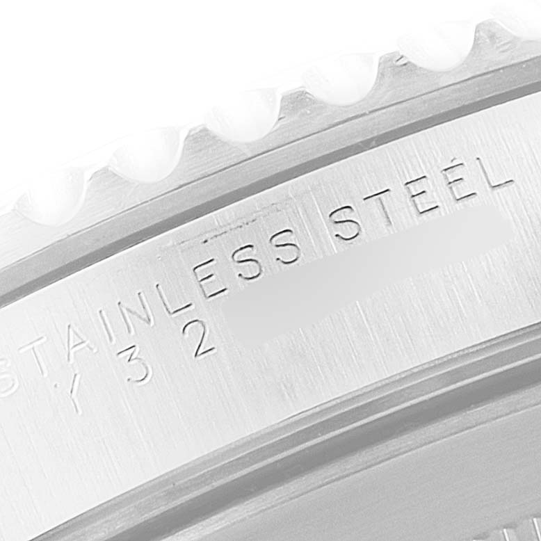 The image shows a close-up view of the stainless steel casing with engravings on a Rolex Submariner 14060 Men's Stainless Steel Black Dial 14060 Men's Stainless Steel Black Dial watch.