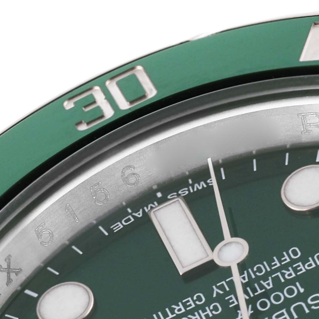 The image shows a close-up of the green bezel and part of the dial of a Rolex Submariner 116610LV Men's Stainless Steel Green Dial 116610LV Men's Stainless Steel Green Dial watch.