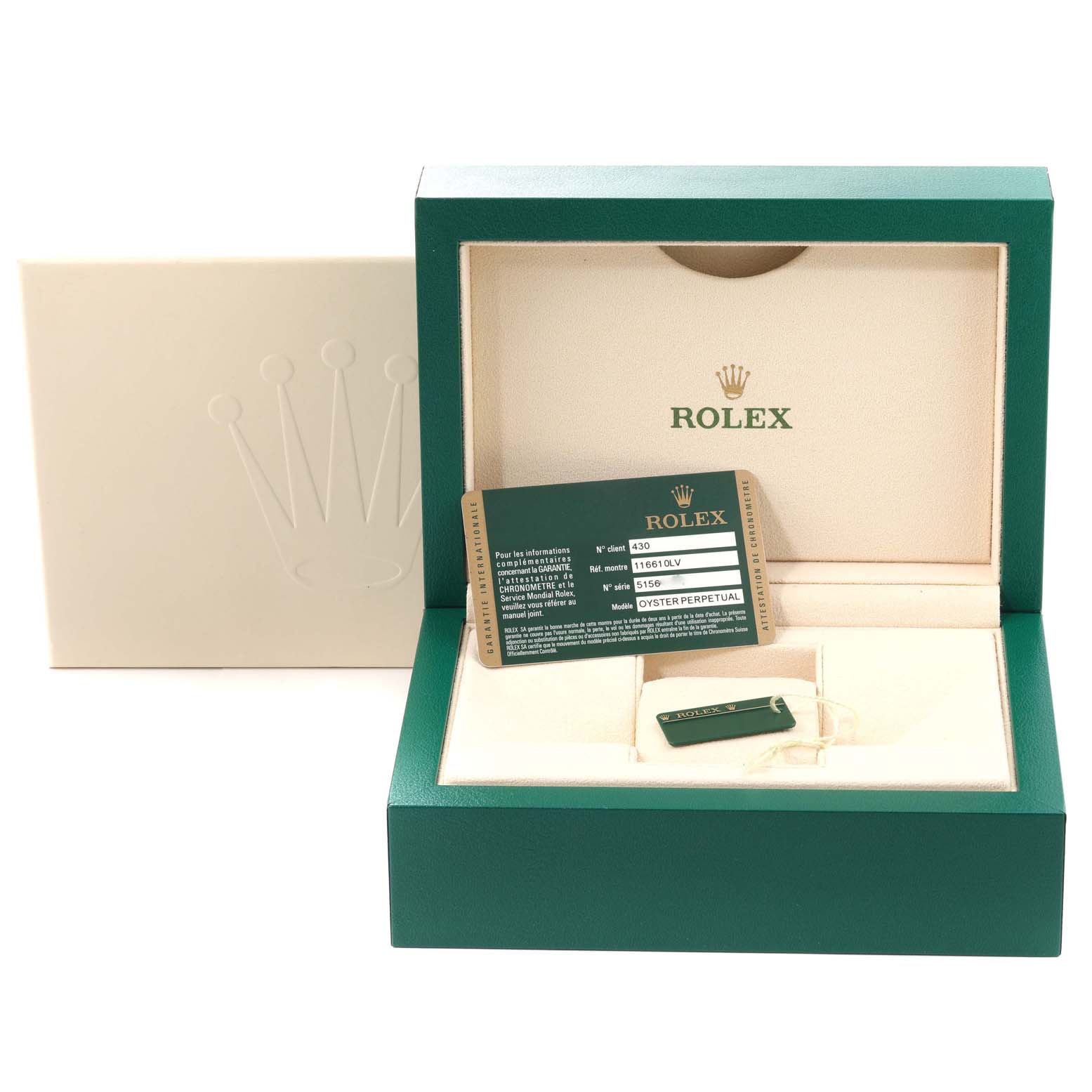 The image shows the packaging, warranty card, and tag of a Rolex Submariner 116610LV Men's Stainless Steel Green Dial 116610LV Men's Stainless Steel Green Dial watch, with no watch visible.