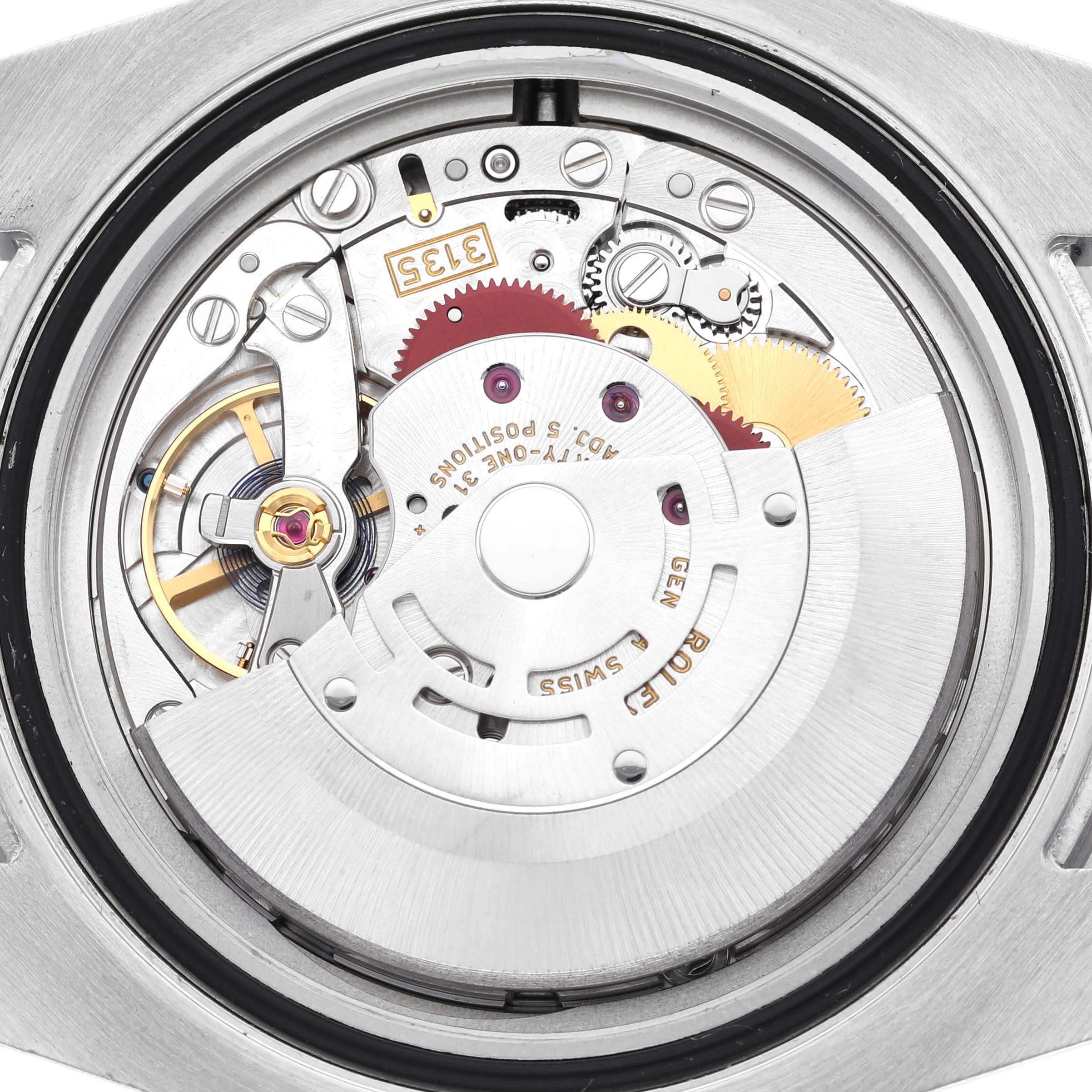 This image shows a close-up of the movement and internal mechanisms of a Rolex Submariner 116610LV Men's Stainless Steel Green Dial 116610LV Men's Stainless Steel Green Dial watch.