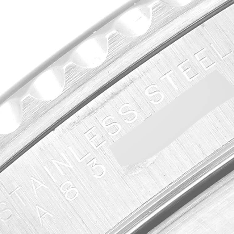 This close-up image shows the side of the case and bezel of a Rolex Submariner 14060 Men
s Stainless Steel Black Dial 14060 Men
s Stainless Steel Black Dial, highlighting the stainless steel engraving.