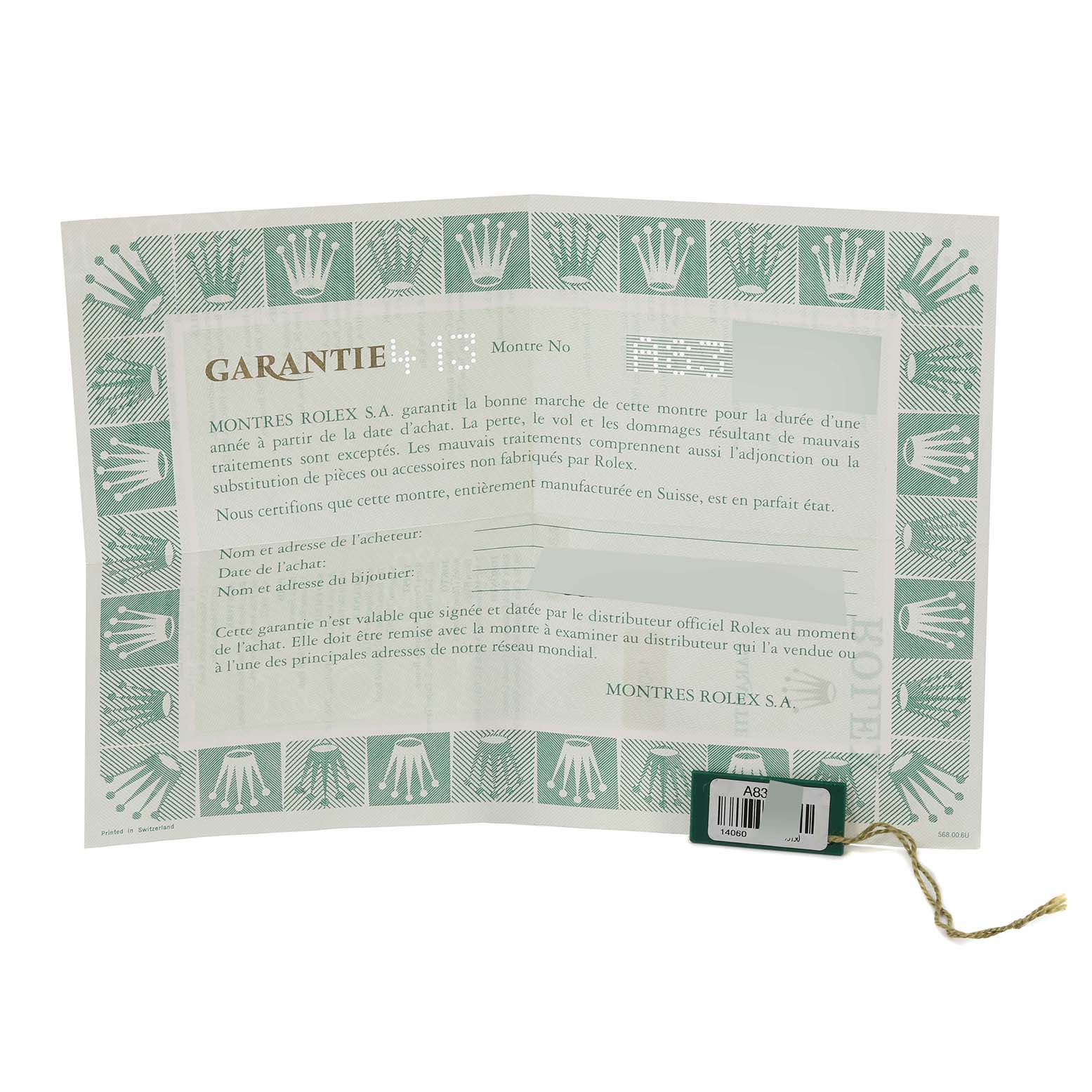 The image shows a warranty certificate and a tag for the Rolex Submariner 14060 Men
s Stainless Steel Black Dial 14060 Men
s Stainless Steel Black Dial watch.