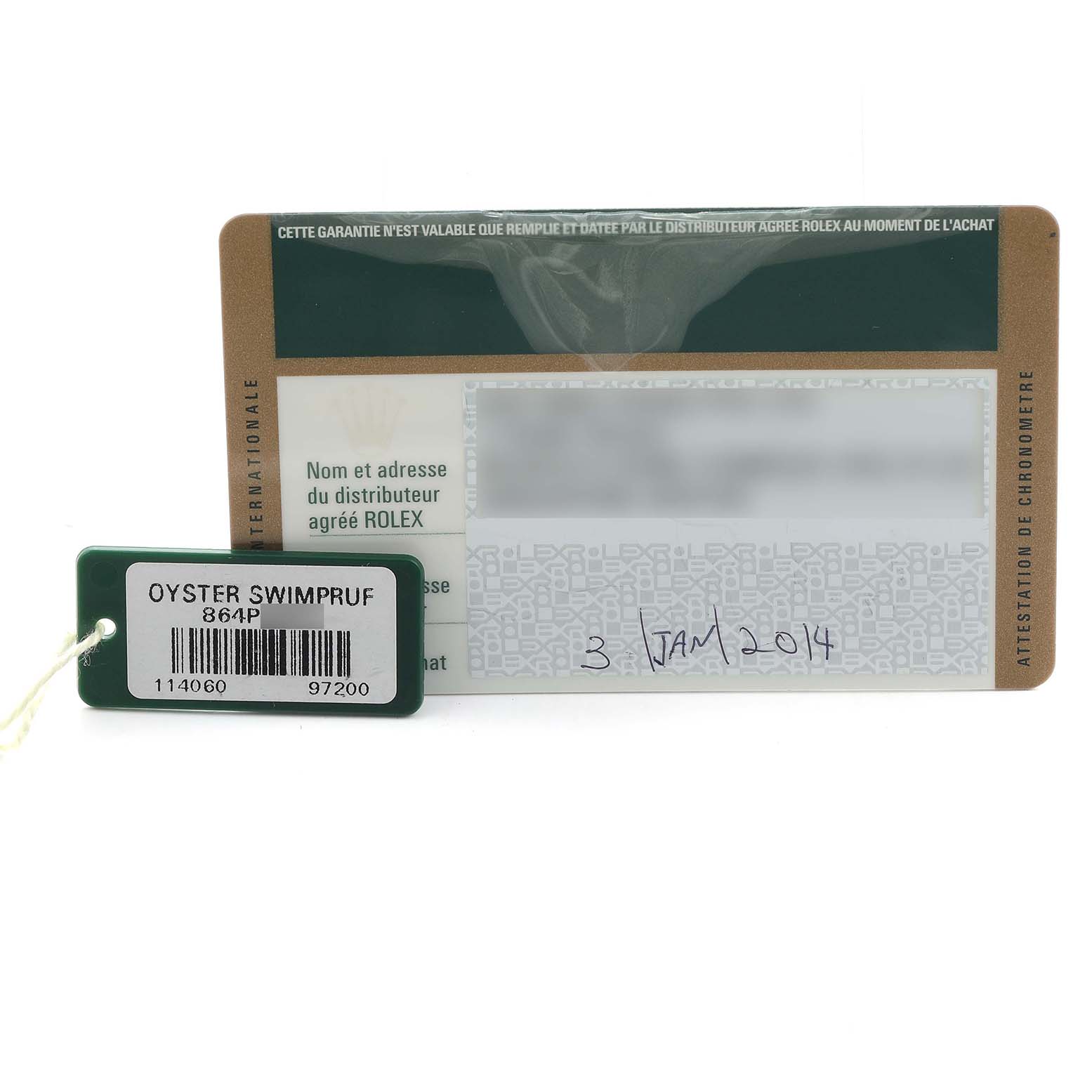The image shows a Rolex Submariner 114060 Men's Stainless Steel Black Dial model's warranty card and a barcode tag labeled "Oyster Swimpruf."