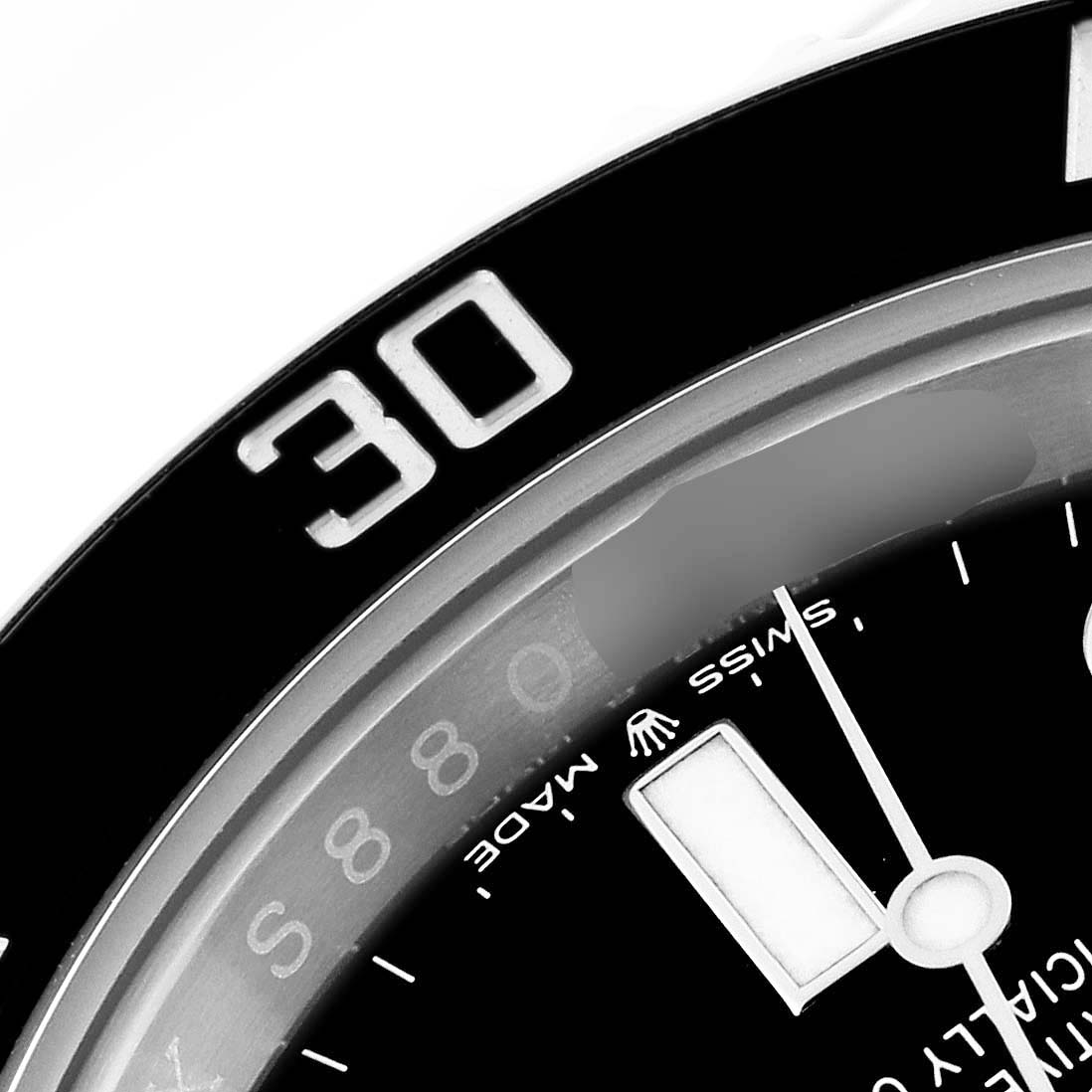 The image shows a close-up of the bezel, dial, and part of the hands of a Rolex Submariner 124060 Men
s Stainless Steel Black Dial 124060 Men
s Stainless Steel Black Dial watch.
