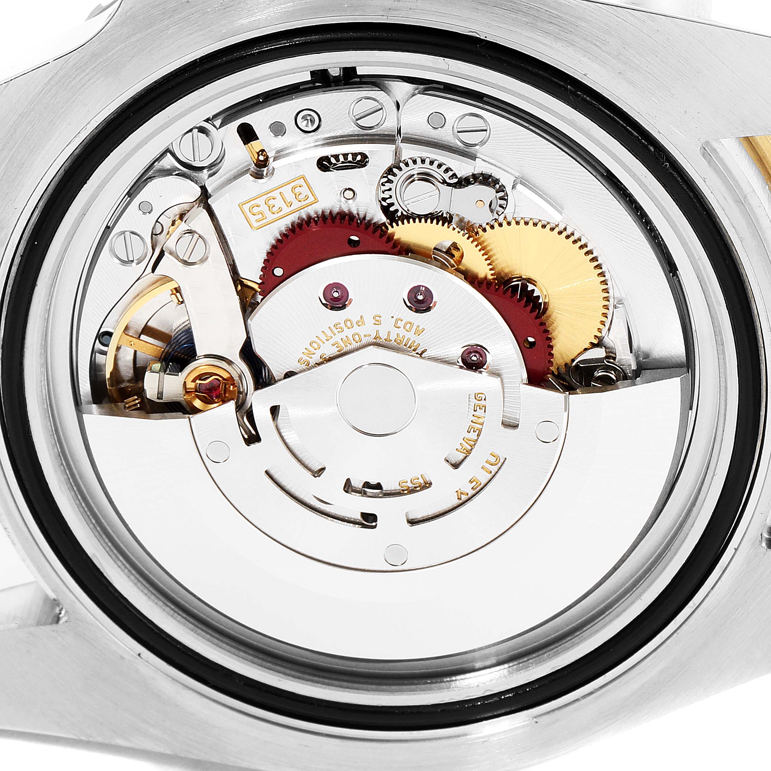 This image shows the internal movement mechanism of the Rolex Submariner 116613 Men's Steel and Gold (two tone) Blue Dial 116613 Men's Steel and Gold (two tone) Blue Dial watch from a close-up, back angle.