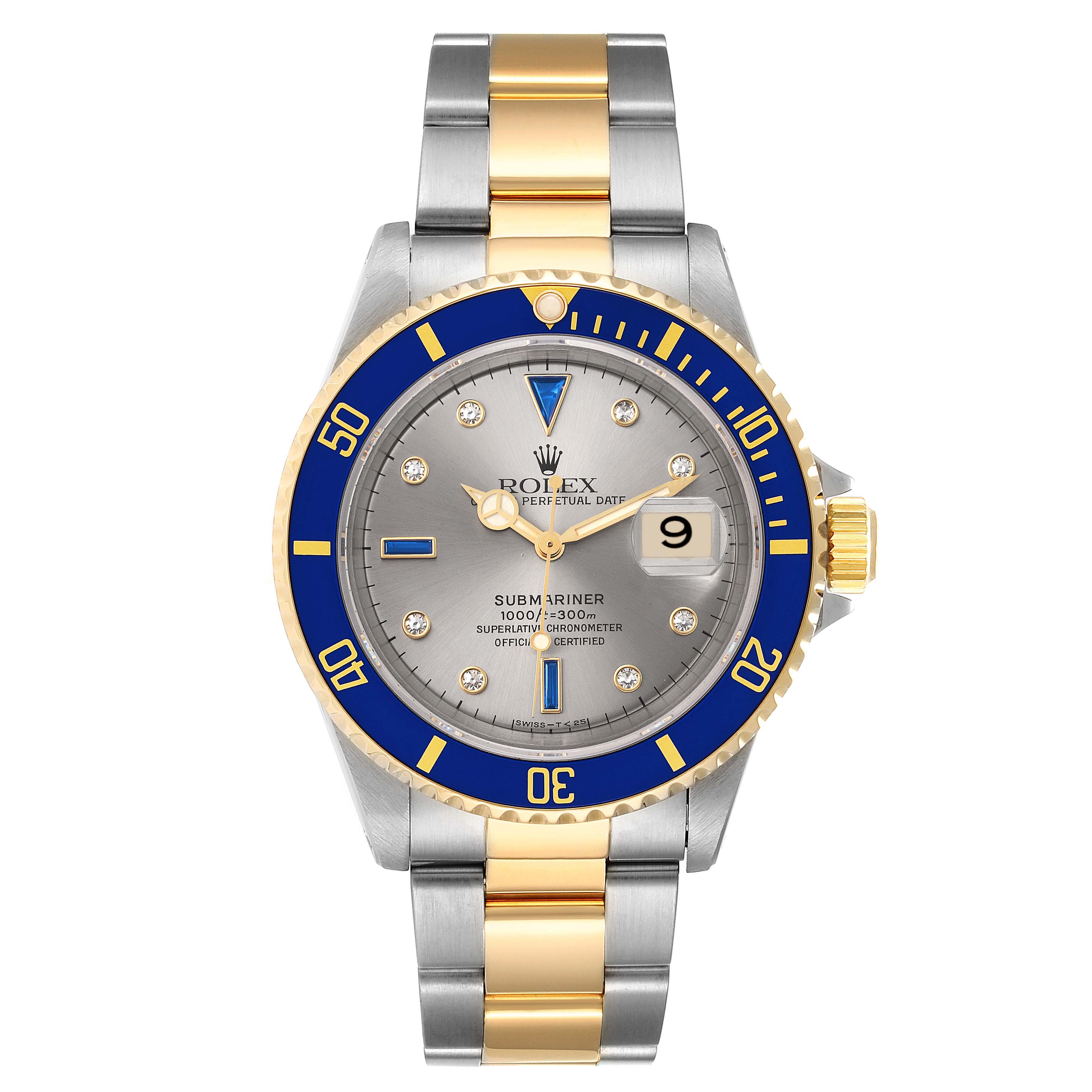 This image shows a front view of a Rolex Submariner 16613 Men
s Steel and Gold (two tone) Grey Dial 16613 Men
s Steel and Gold (two tone) Grey Dial watch with a gold and steel bracelet, blue bezel, and silver dial.