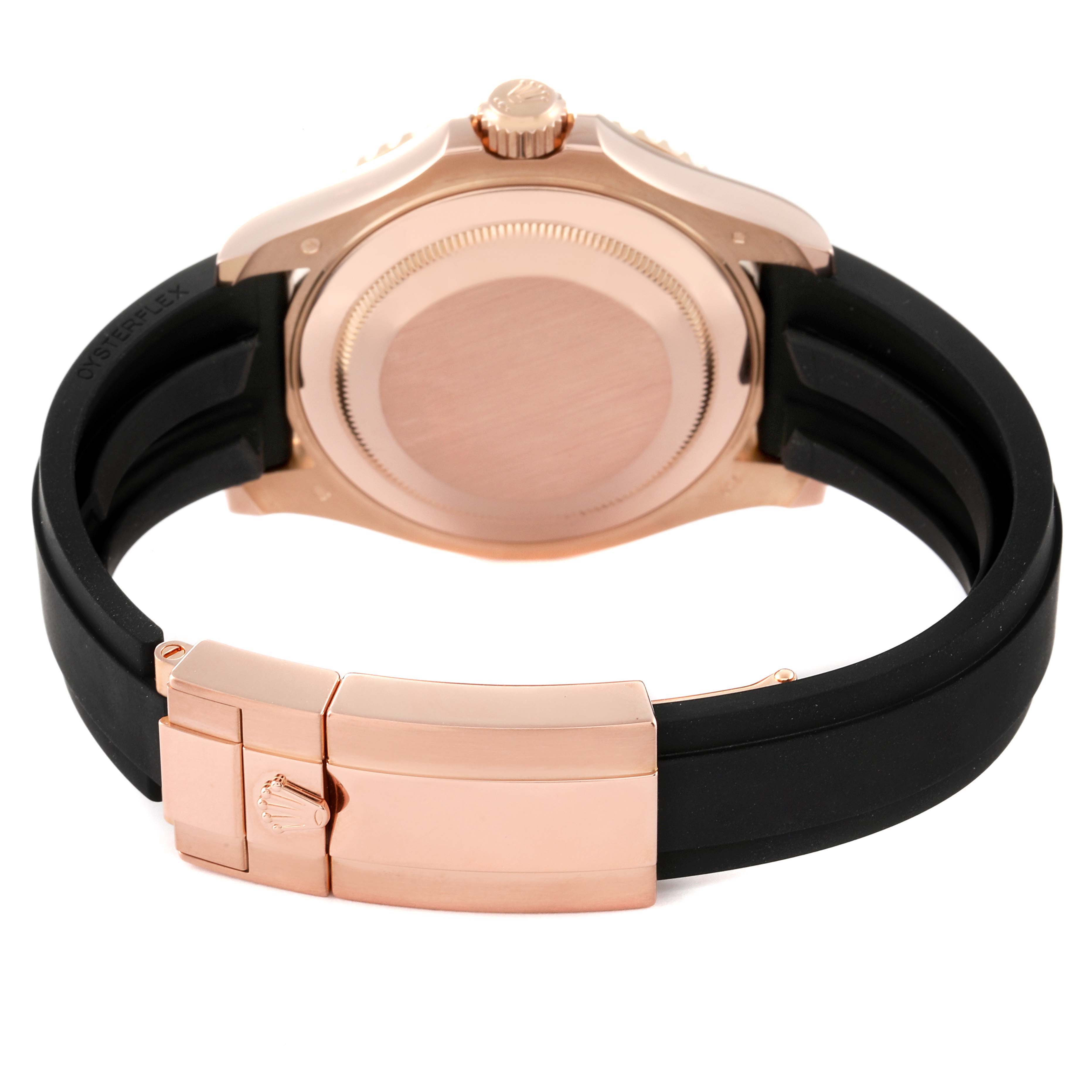 This image shows the back view and clasp of a Rolex Yacht-Master 116655 Men's Rose Gold Black Dial 116655 Men's Rose Gold Black Dial watch with a black strap and rose gold casing.