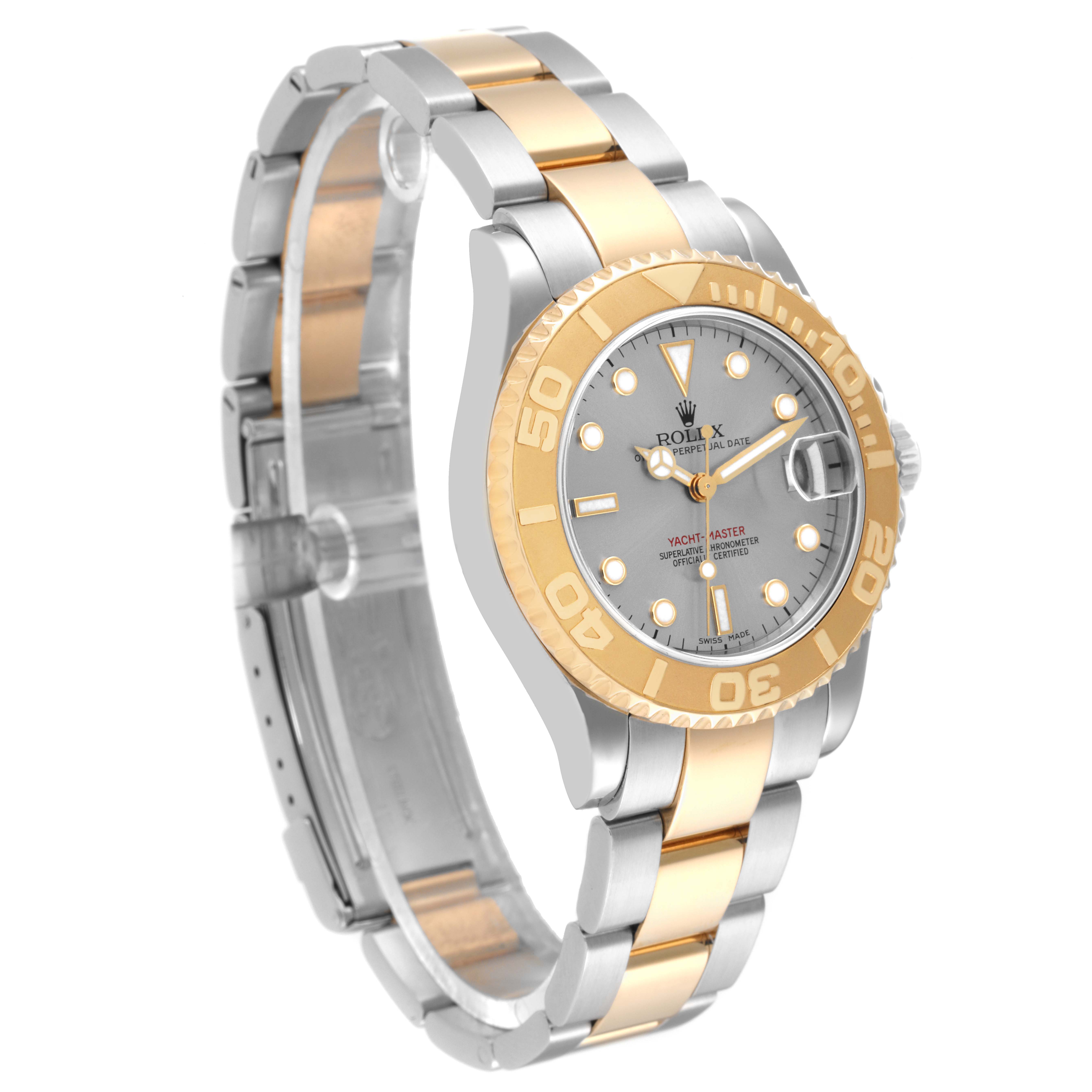 The image shows a Rolex Yacht-Master 168623 Men's Steel and Gold (two tone) Grey Dial 168623 Men's Steel and Gold (two tone) Grey Dial watch viewed at a slight angle, showcasing its gold and silver bracelet, bezel, and dial.