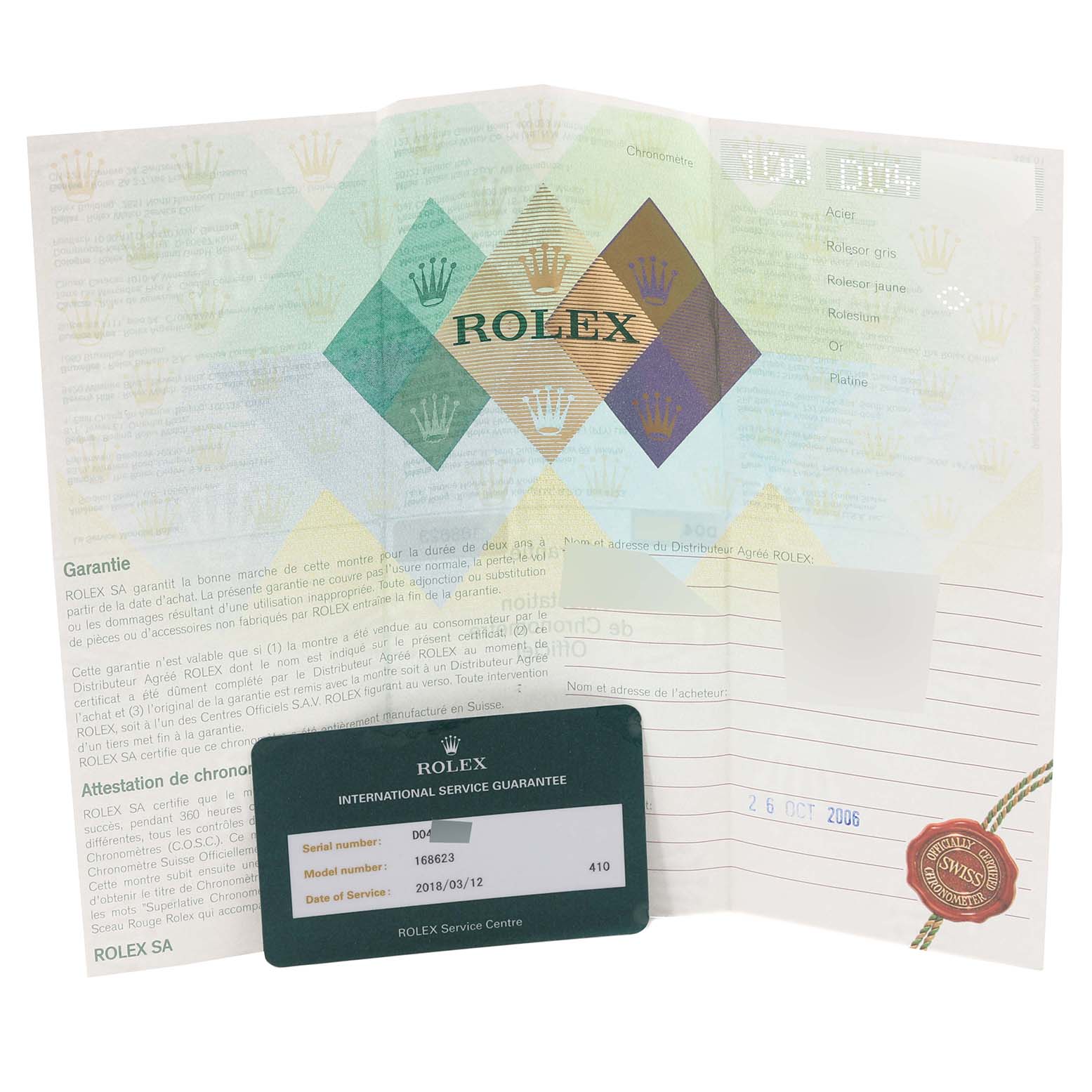 The image shows a Rolex Yacht-Master 168623 Men's Steel and Gold (two tone) Grey Dial 168623 Men's Steel and Gold (two tone) Grey Dial warranty card and booklet, including model details and service information.