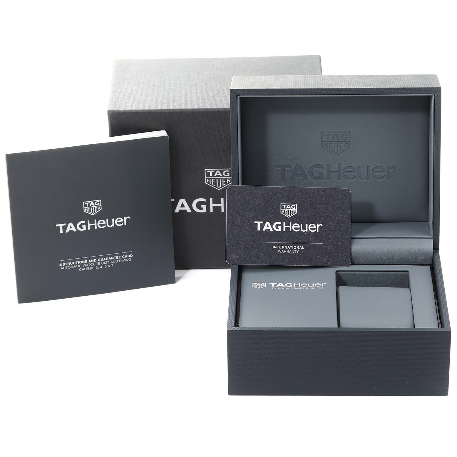 The image shows the packaging, instruction manual, and warranty card for a Tag Heuer Aquaracer WBD2111.BA0928 Men's Stainless Steel White Dial WBD2111.BA0928 Men's Stainless Steel White Dial watch.