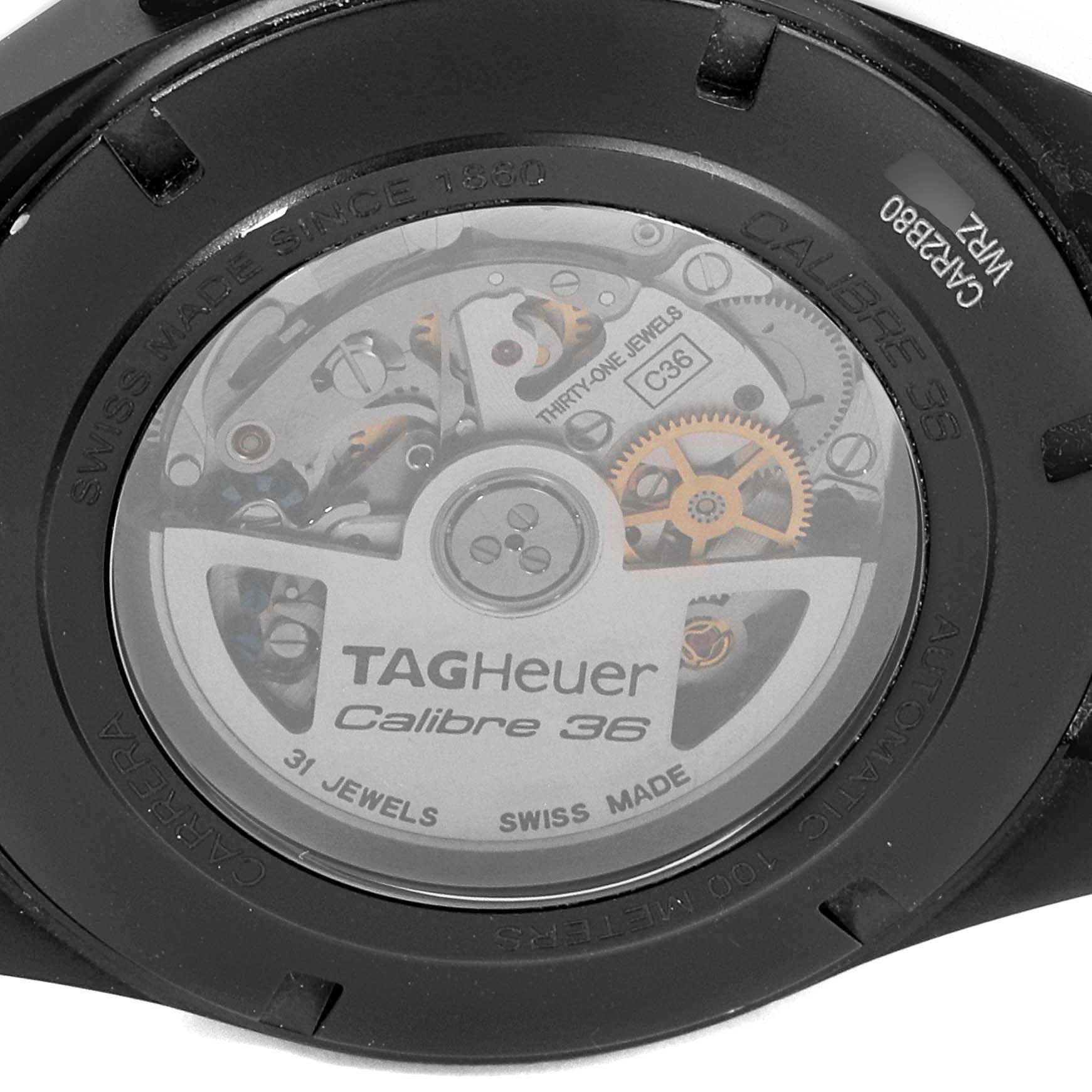 The image shows the back of a Tag Heuer Carrera CAR2B80.FC6325 Men's Titanium Black Dial CAR2B80.FC6325 Men's Titanium Black Dial watch, highlighting its Calibre 36 movement and internal mechanisms.