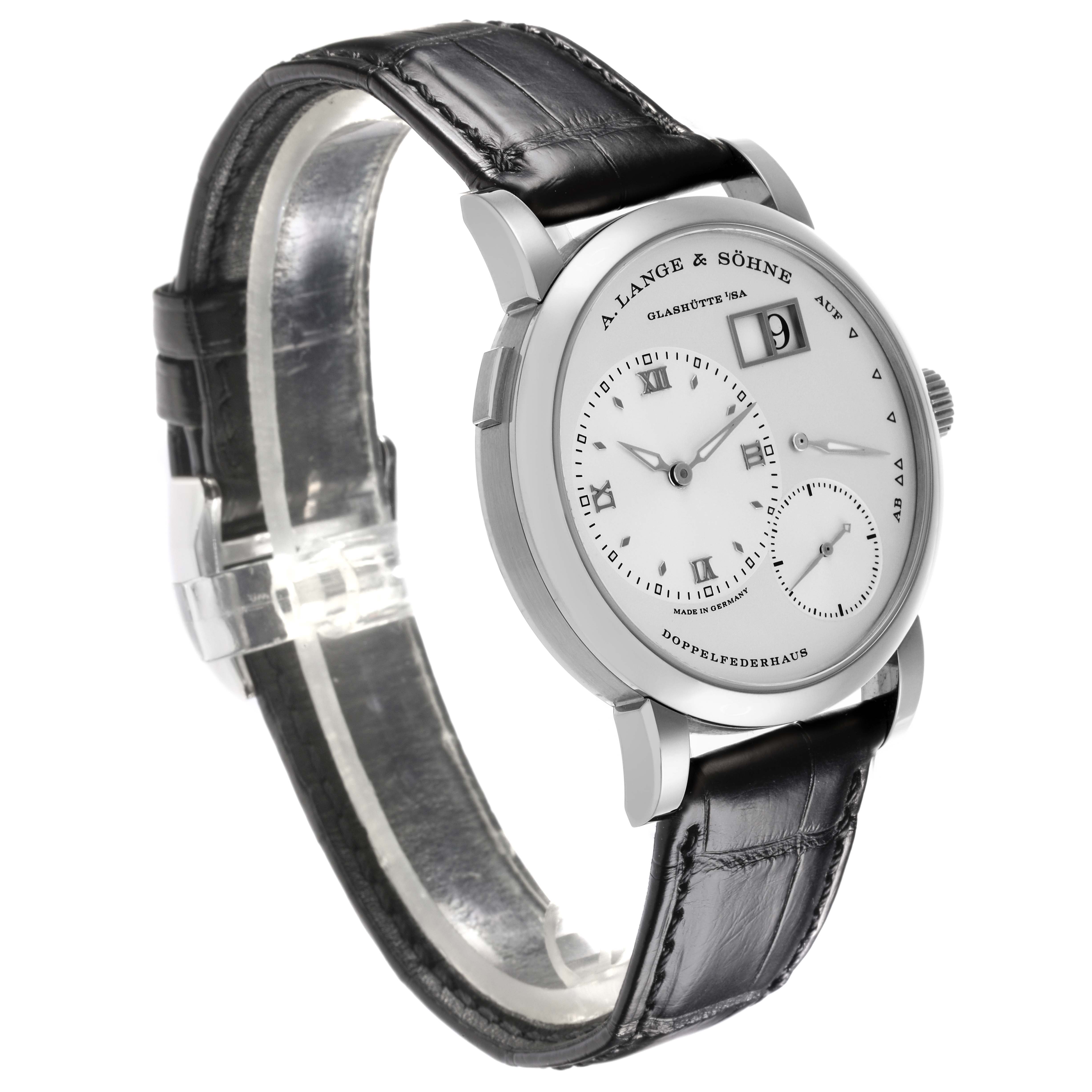 The Lange 1 model by A. Lange 
Söhne is shown at a side angle, highlighting the face, lugs, and black leather strap.