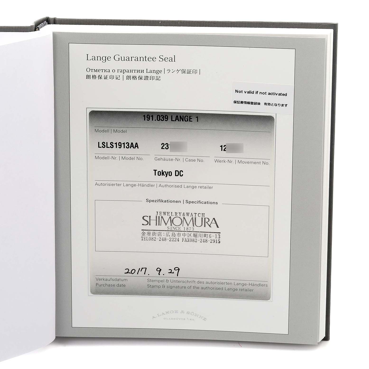 The image shows an A. Lange 
Sohne Lange 1 191.039 Men
s White Gold Silver Dial warranty booklet with details and retailer information.