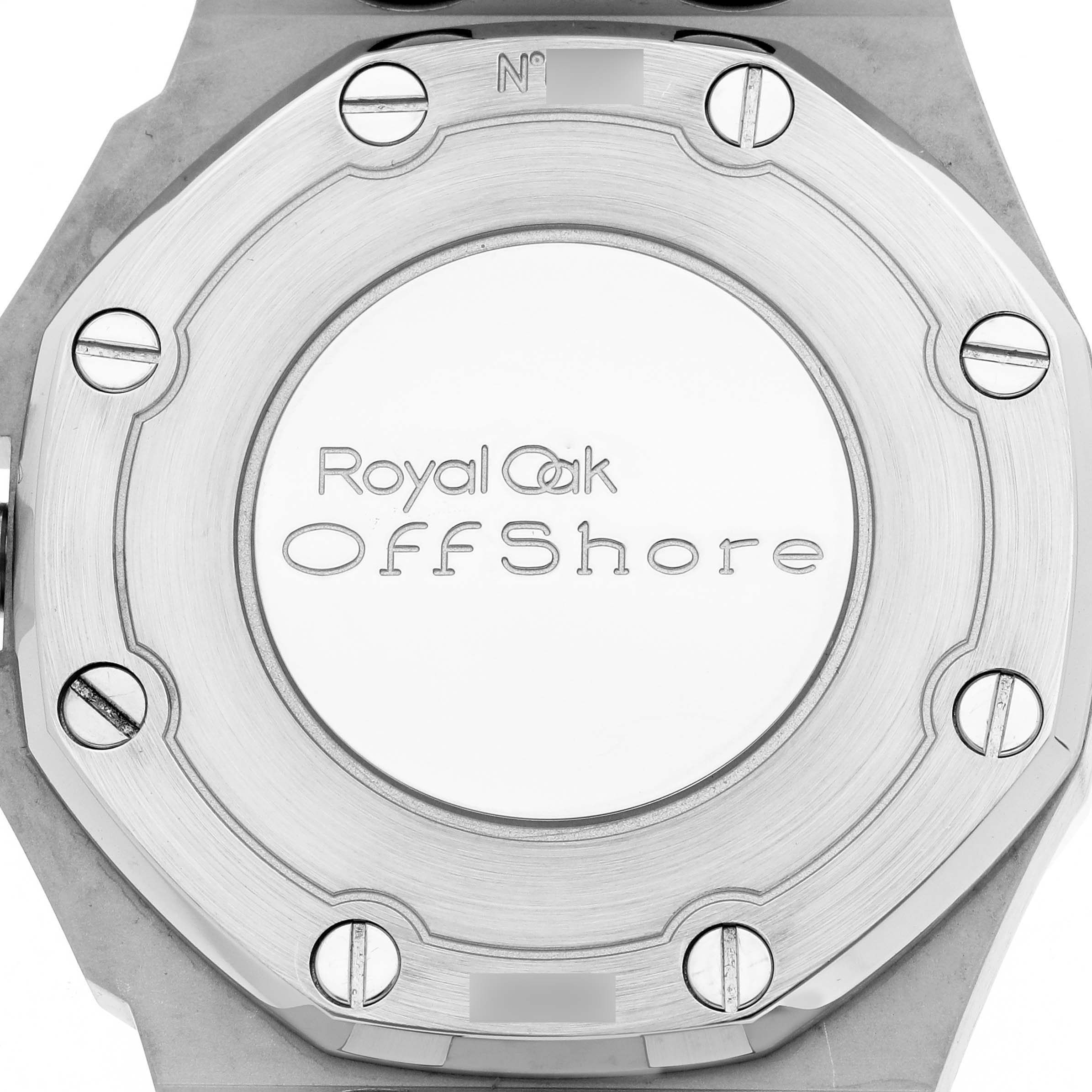 This image shows the case back of an Audemars Piguet Royal Oak Offshore 67540SK.ZZ.A010CA.01 Women's Stainless Steel Silver Dial, highlighting its engraved logo and screws.