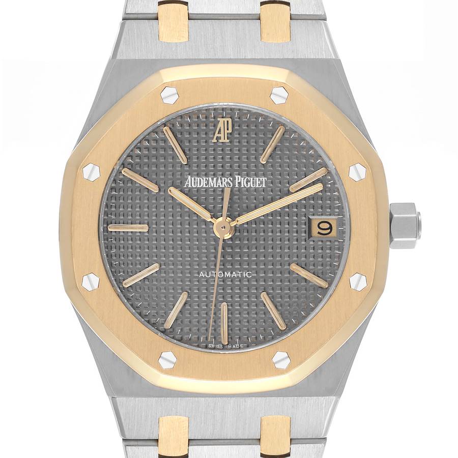 The Audemars Piguet Royal Oak watch is shown from the front, highlighting the dial, bezel, crown, and bracelet links.