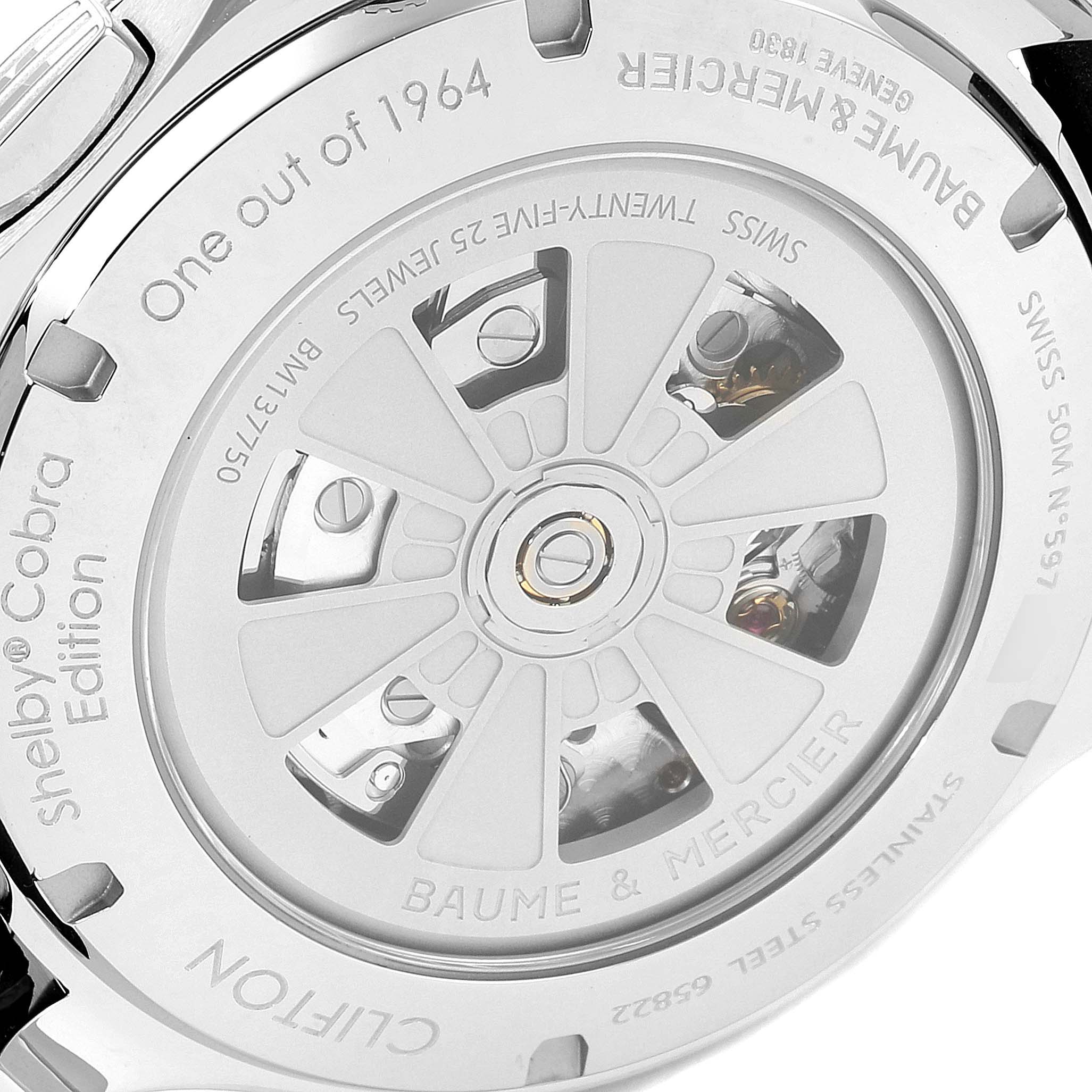 The image shows the back view of the Baume & Mercier Clifton M0A10343 Men's Stainless Steel Blue Dial M0A10343 Men's Stainless Steel Blue Dial model watch, featuring the rotor and inscriptions.