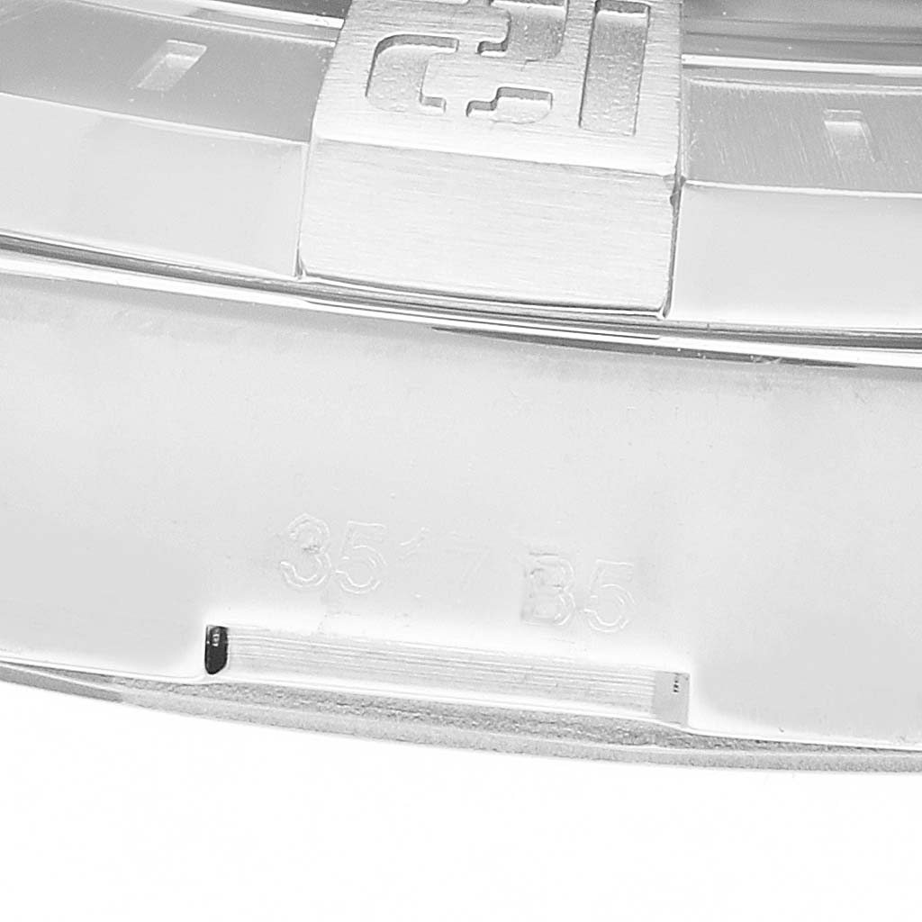 The image shows a close-up of the bezel and a part of the case back of the Breitling Avenger A3239011/A809 Men's Stainless Steel Mother of Pearl Dial watch.