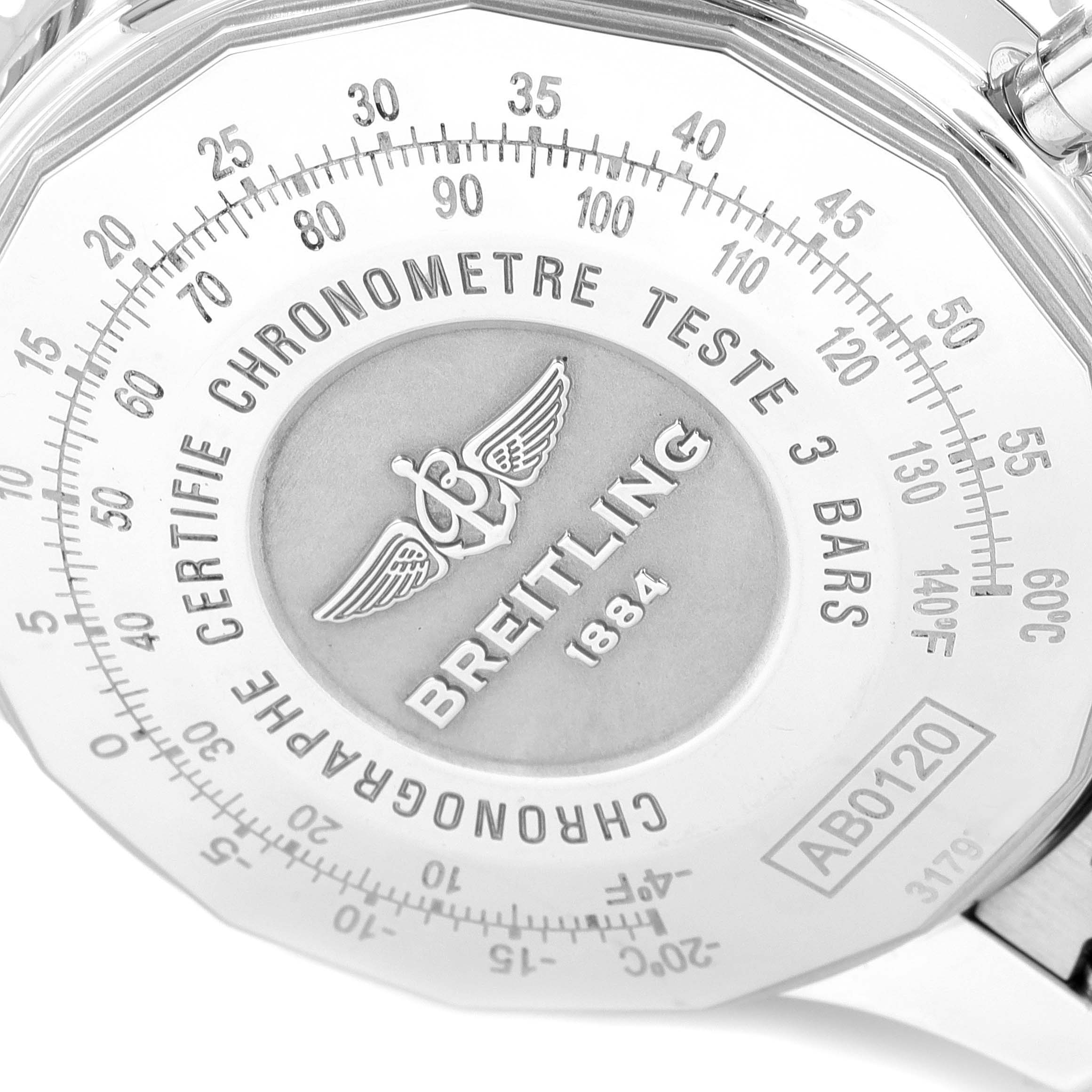 This image shows a close-up of the back case of a Breitling Navitimer AB0120 Men's Stainless Steel Black Dial AB0120 Men's Stainless Steel Black Dial, featuring brand engravings and calibration markings.