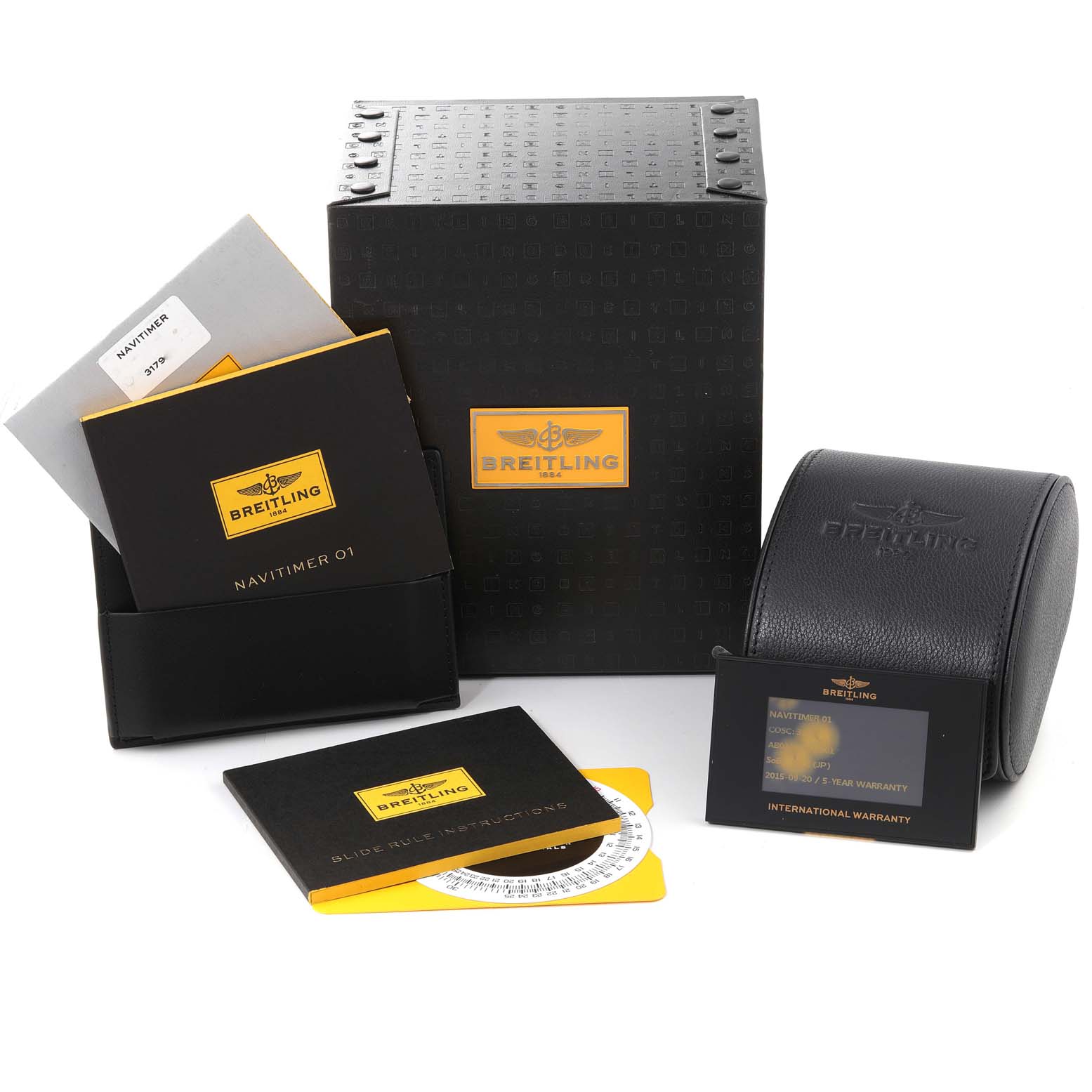 The image shows accessories for the Breitling Navitimer AB0120 Men's Stainless Steel Black Dial AB0120 Men's Stainless Steel Black Dial model, including a box, warranty card, booklet, and carrying case.