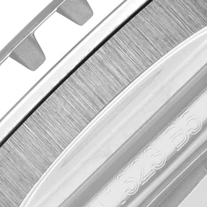 The image shows the side view of the Breitling Superocean A17375 Men's Stainless Steel White Dial A17375 Men's Stainless Steel White Dial's textured bezel and part of the crown detail.