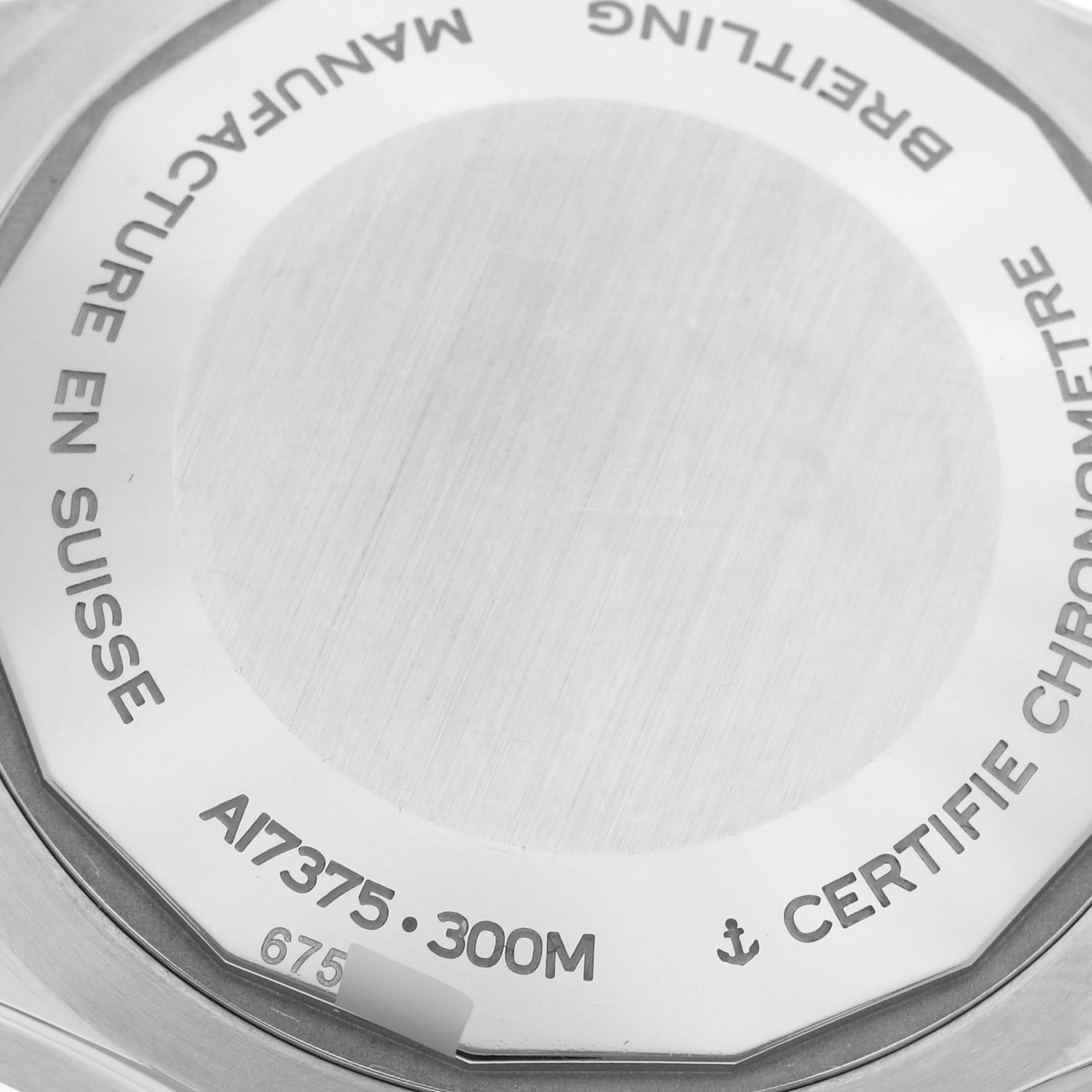 The image shows the case back of a Breitling Superocean A17375 Men's Stainless Steel White Dial A17375 Men's Stainless Steel White Dial watch, highlighting inscriptions and specifications.