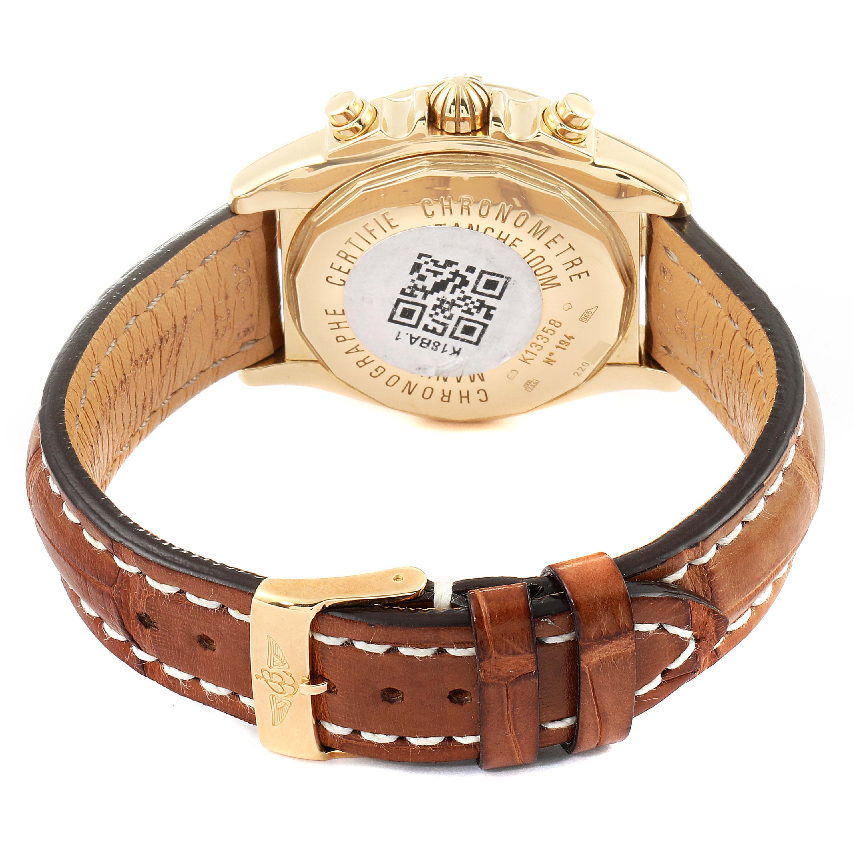 This image shows the back view of a Breitling Chronomat K13358 Men's Yellow Gold Mother of Pearl Dial K13358 Men's Yellow Gold Mother of Pearl Dial watch, highlighting its case back, crown, pushers, and leather strap.