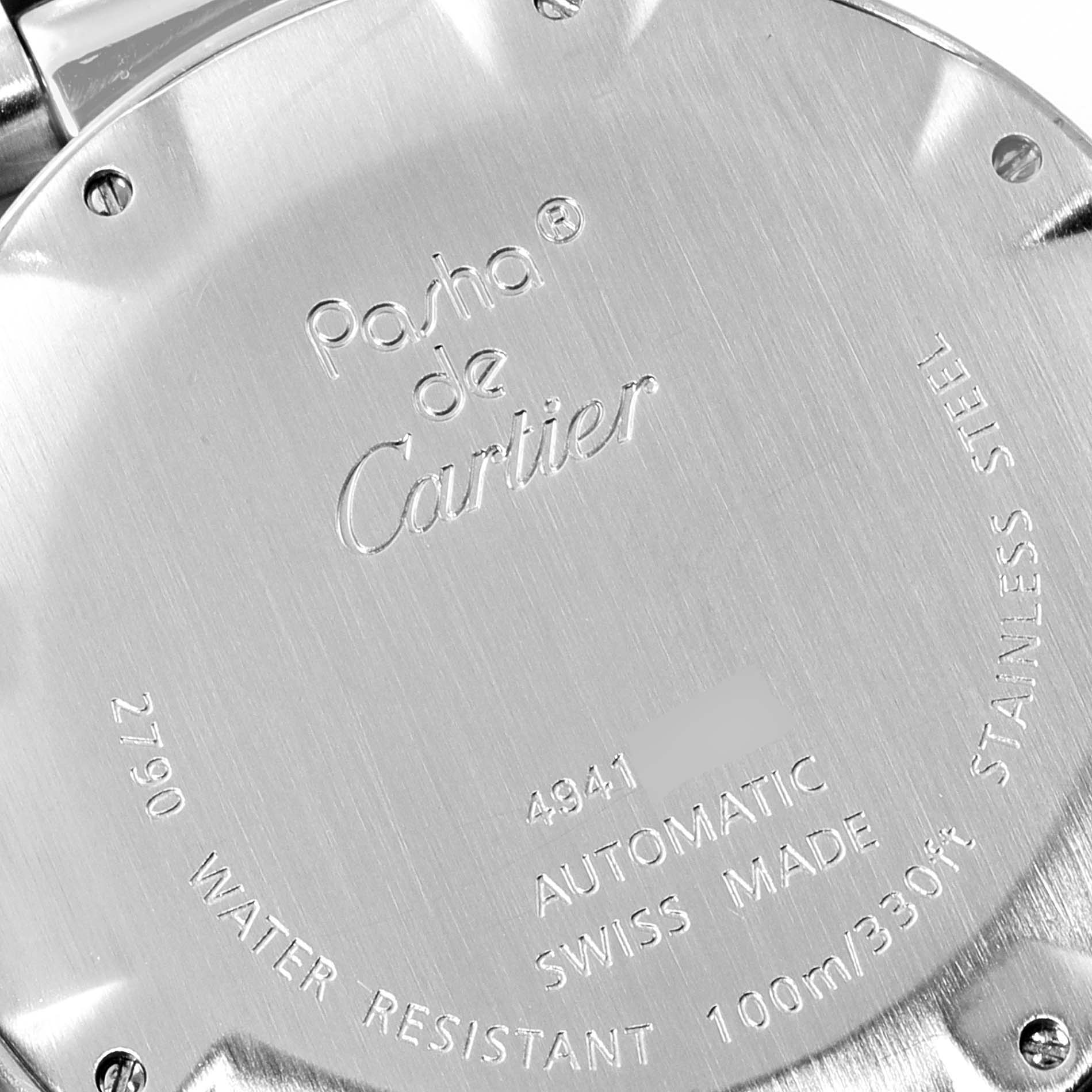 This image shows the back case of a Pasha de Cartier watch, highlighting its engraving details and water resistance.