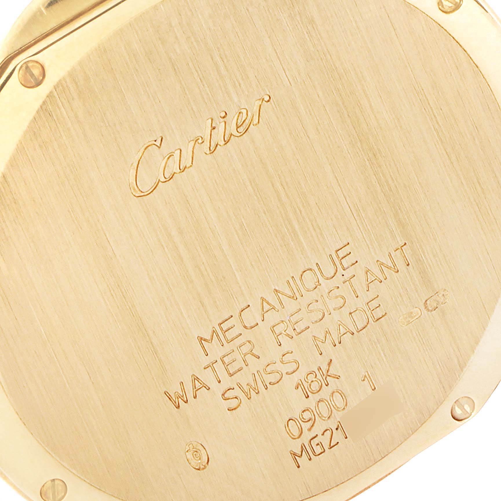 This image shows the engraved back case of a Cartier Ronde 0900 Men's Yellow Gold Silver Dial 0900 Men's Yellow Gold Silver Dial watch, highlighting the brand, material, and specifications.