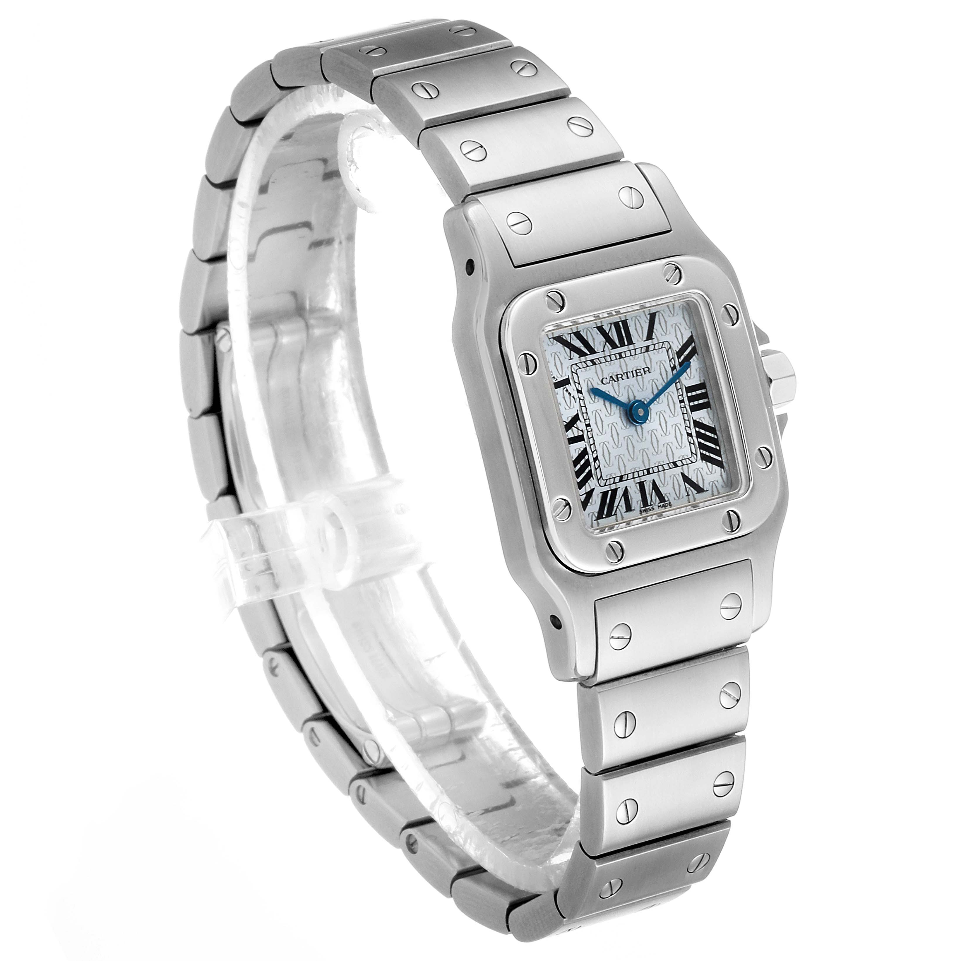 This image shows a Cartier Santos W20064D6 Women's Stainless Steel Blue Dial W20064D6 Women's Stainless Steel Blue Dial watch from a side angle, highlighting its bezel, dial, and bracelet.