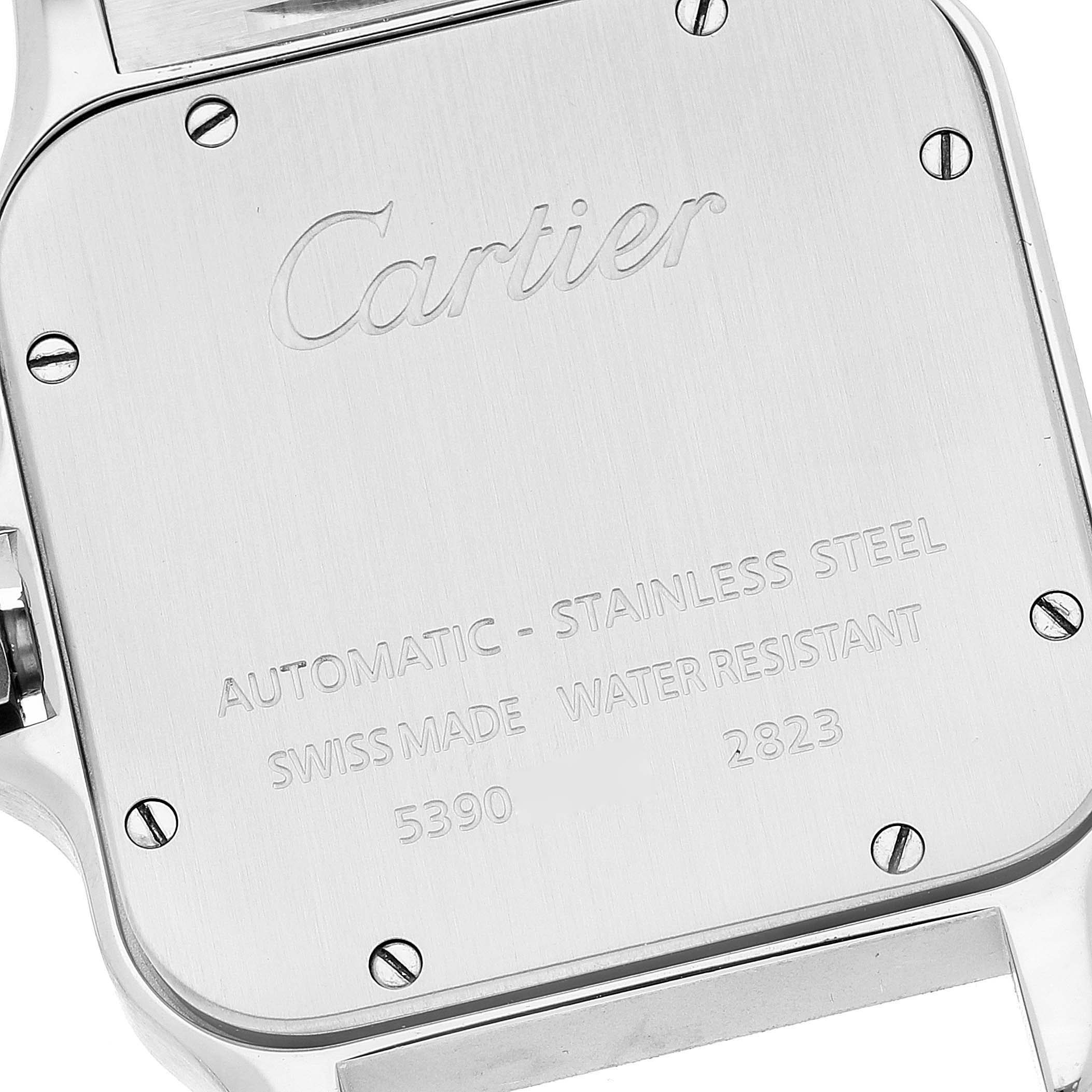 The image shows the back case of a Cartier Santos W20098D6 Men
s Stainless Steel Silver Dial W20098D6 Men
s Stainless Steel Silver Dial model watch, highlighting its brand engraving and technical details.
