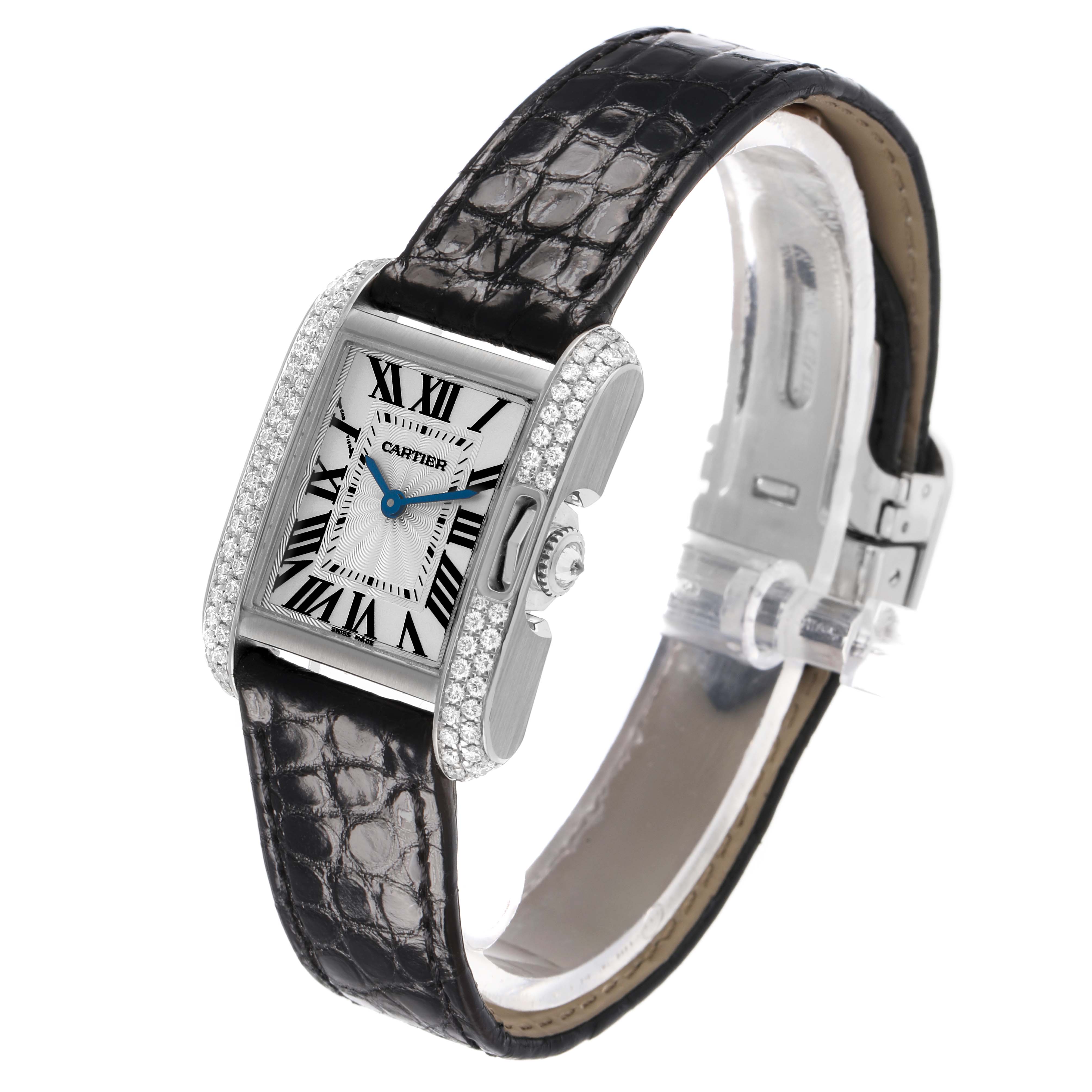 The Cartier Tank Anglaise WT100015 Women's White Gold Silver Dial watch is shown at a front angle, highlighting the face, strap, and diamond-studded bezel.