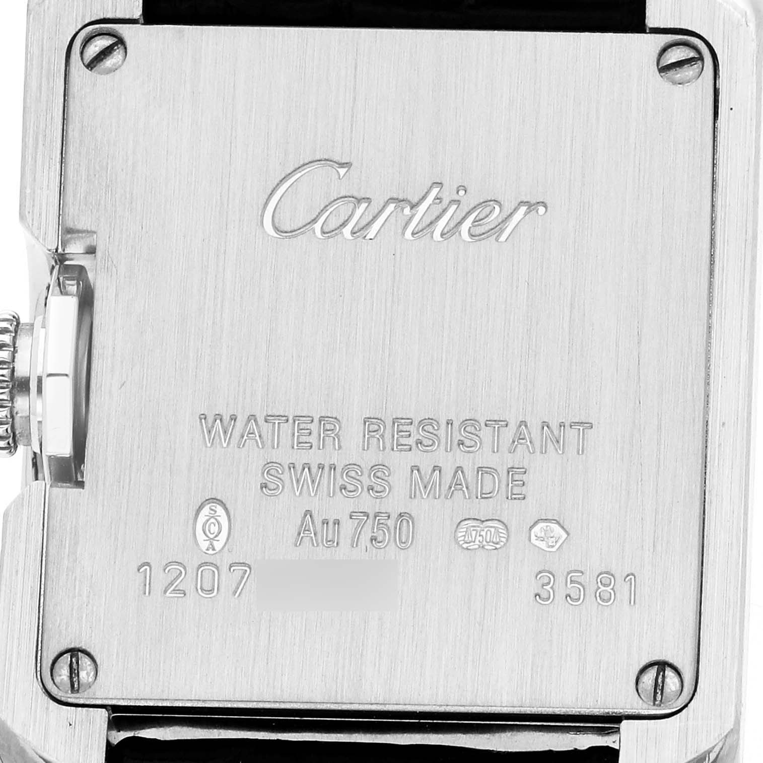 The image shows the back case of a Cartier Tank Anglaise WT100015 Women's White Gold Silver Dial watch, displaying engravings and corner screws.