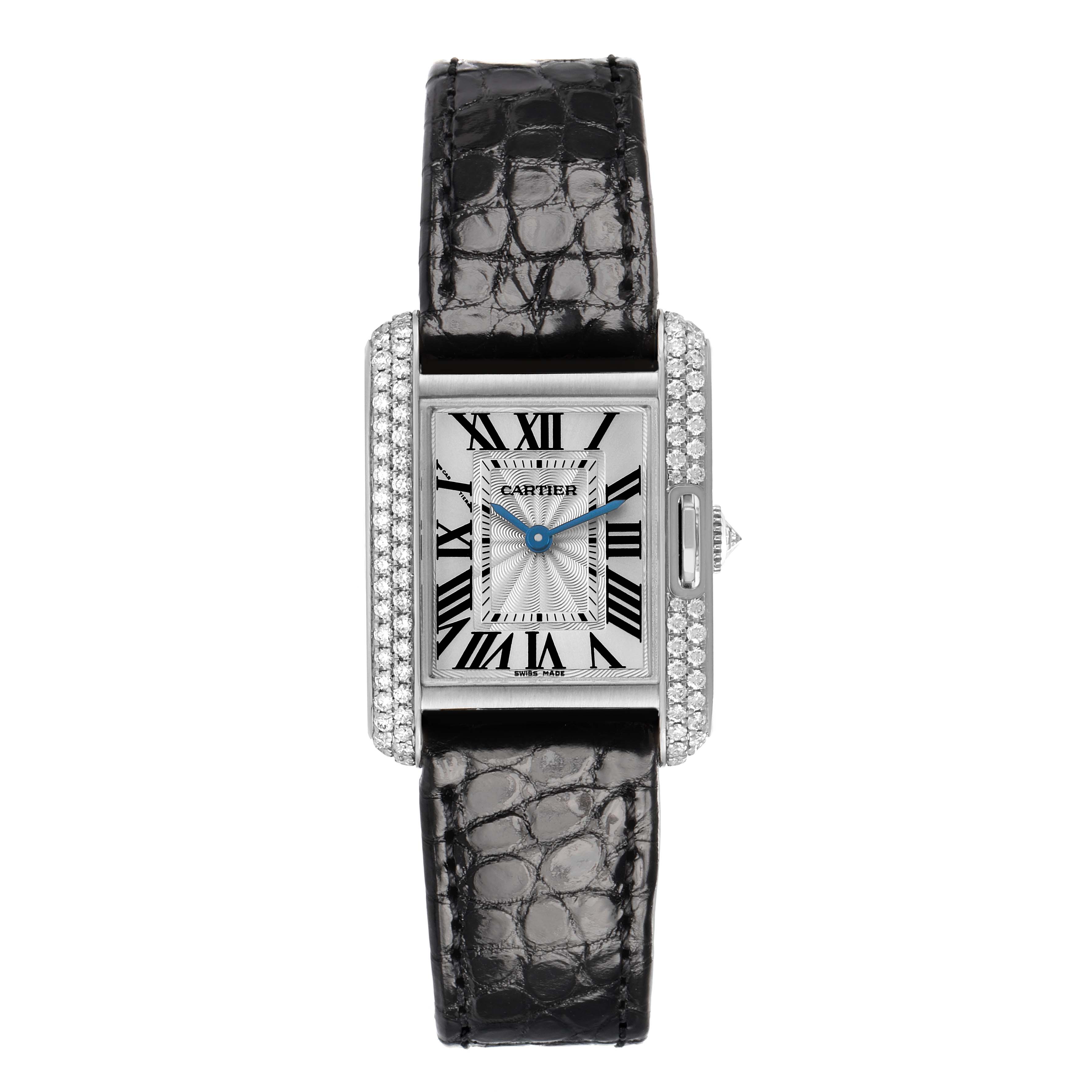 The image shows a Cartier Tank Anglaise WT100015 Women's White Gold Silver Dial watch from a top-down angle, highlighting the face, Roman numerals, and diamond-set bezel.