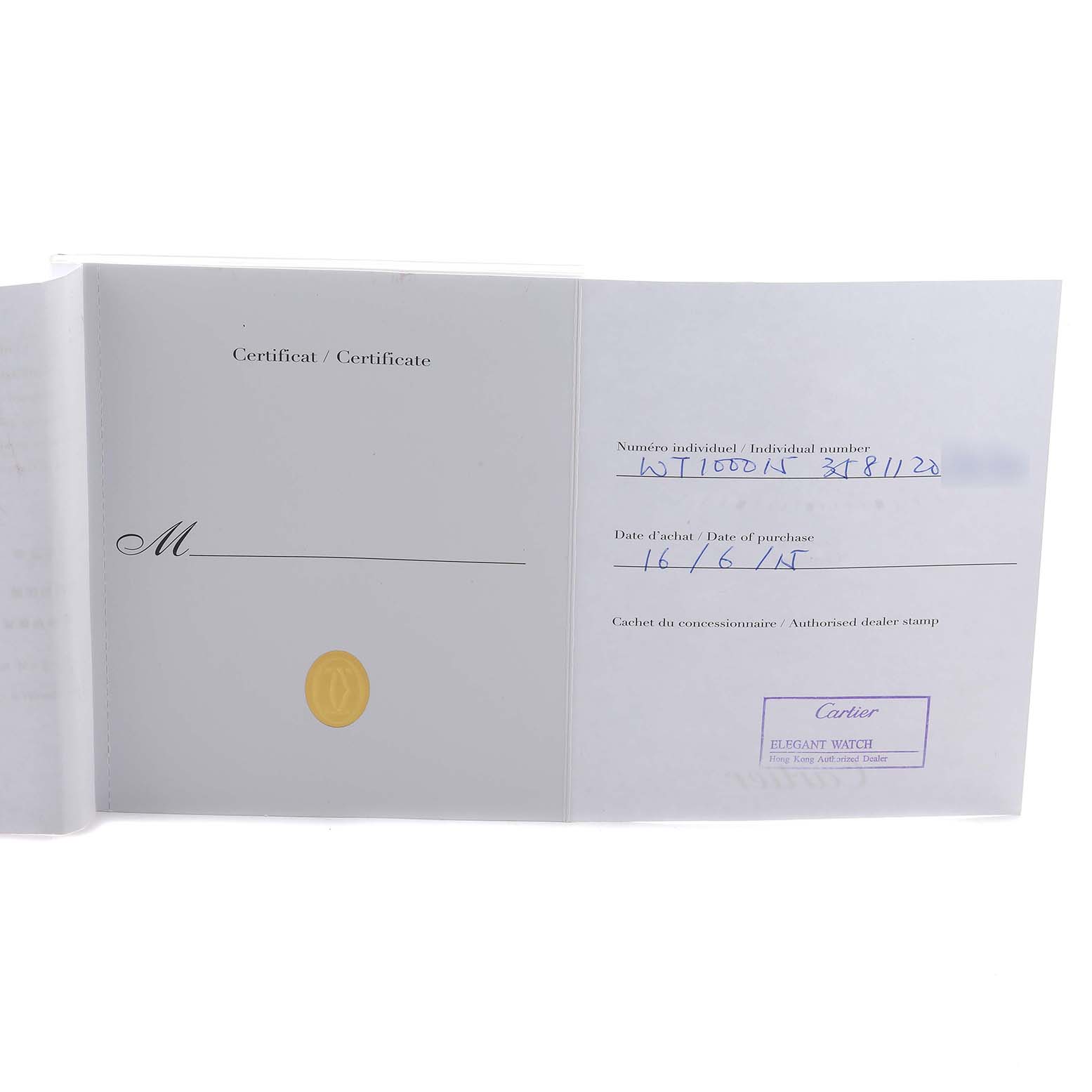 The image shows the certificate and warranty papers for a Cartier Tank Anglaise WT100015 Women's White Gold Silver Dial watch.