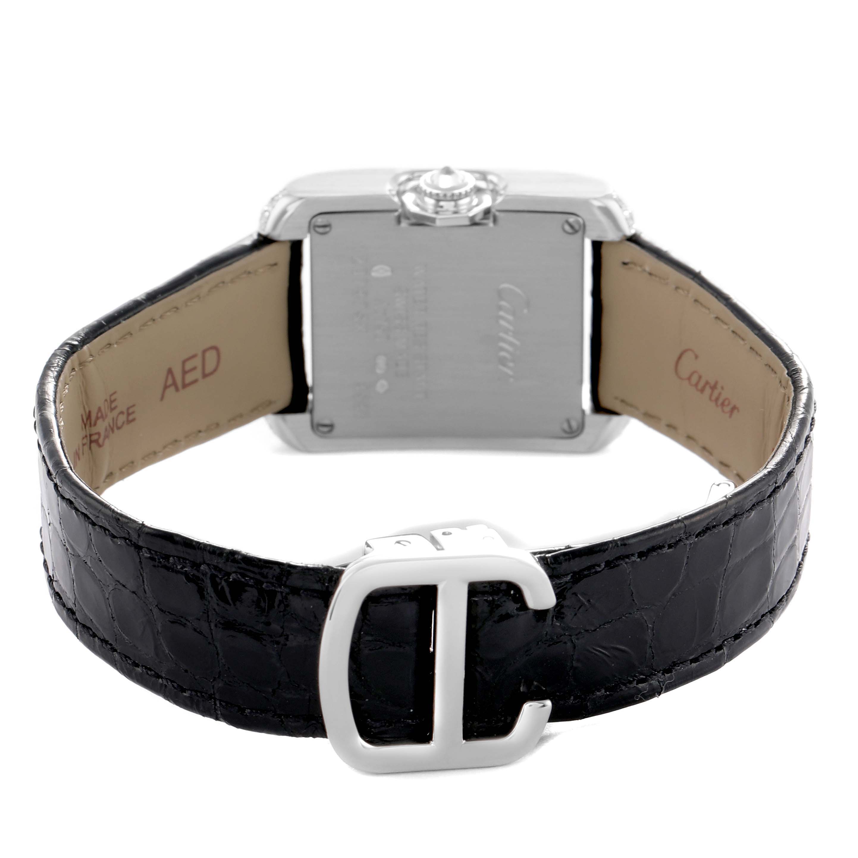 The Cartier Tank Anglaise WT100015 Women's White Gold Silver Dial watch is shown from the back, highlighting the clasp, case back, and leather strap.