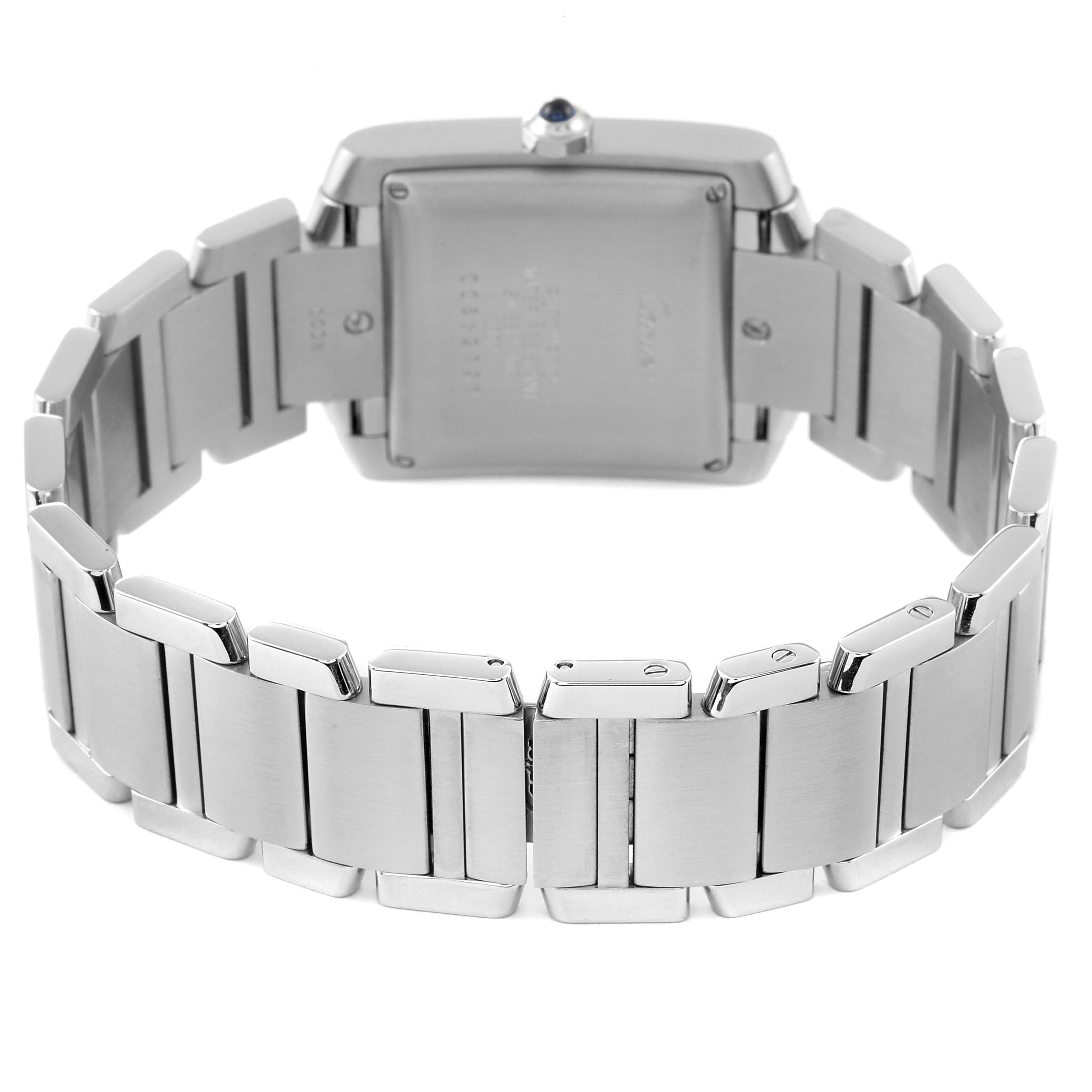 The image shows the rear view of a Tank Française model by Cartier, focusing on the stainless steel bracelet and case back.