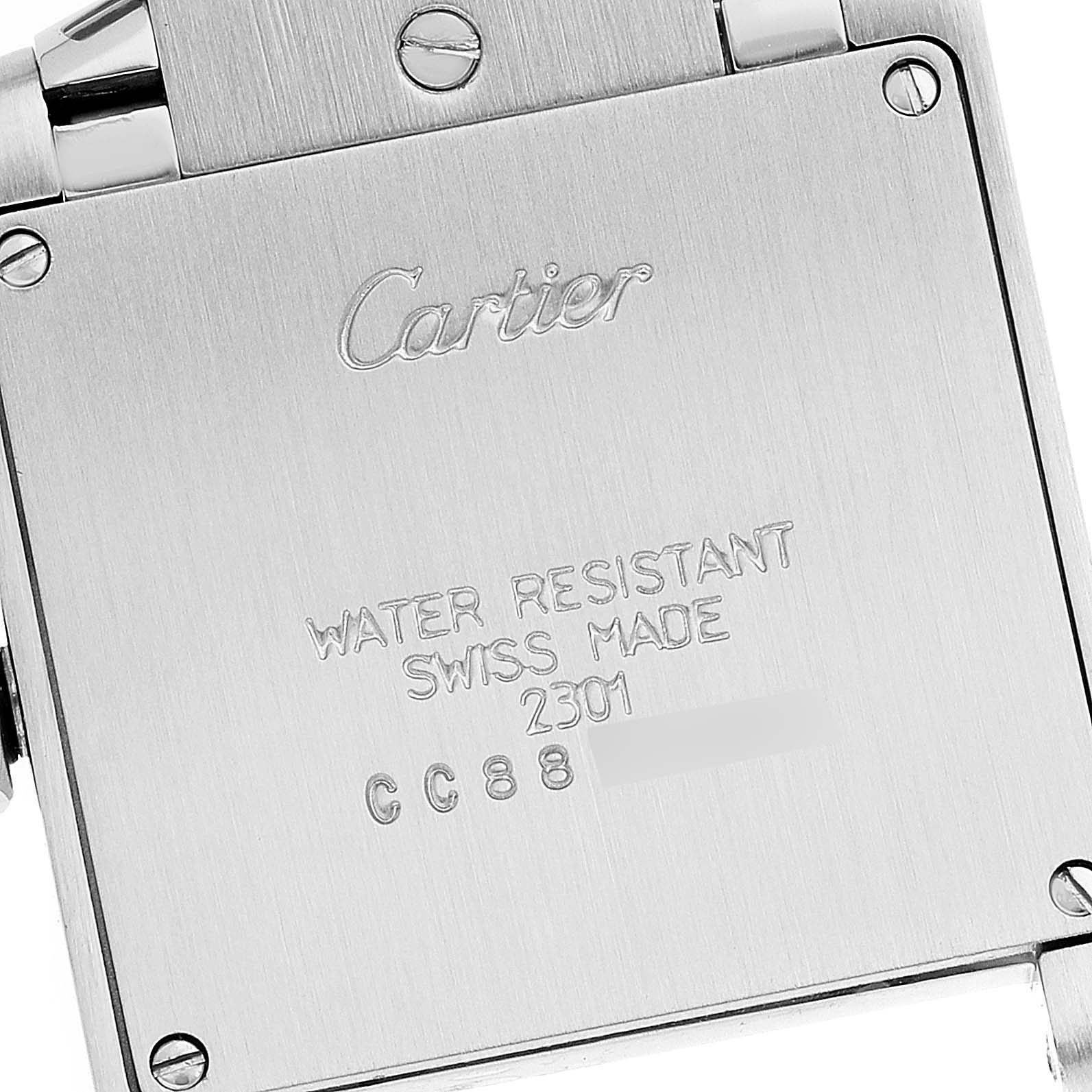The image shows the back case of a Cartier Tank Française watch, providing details such as water resistance and "Swiss Made."