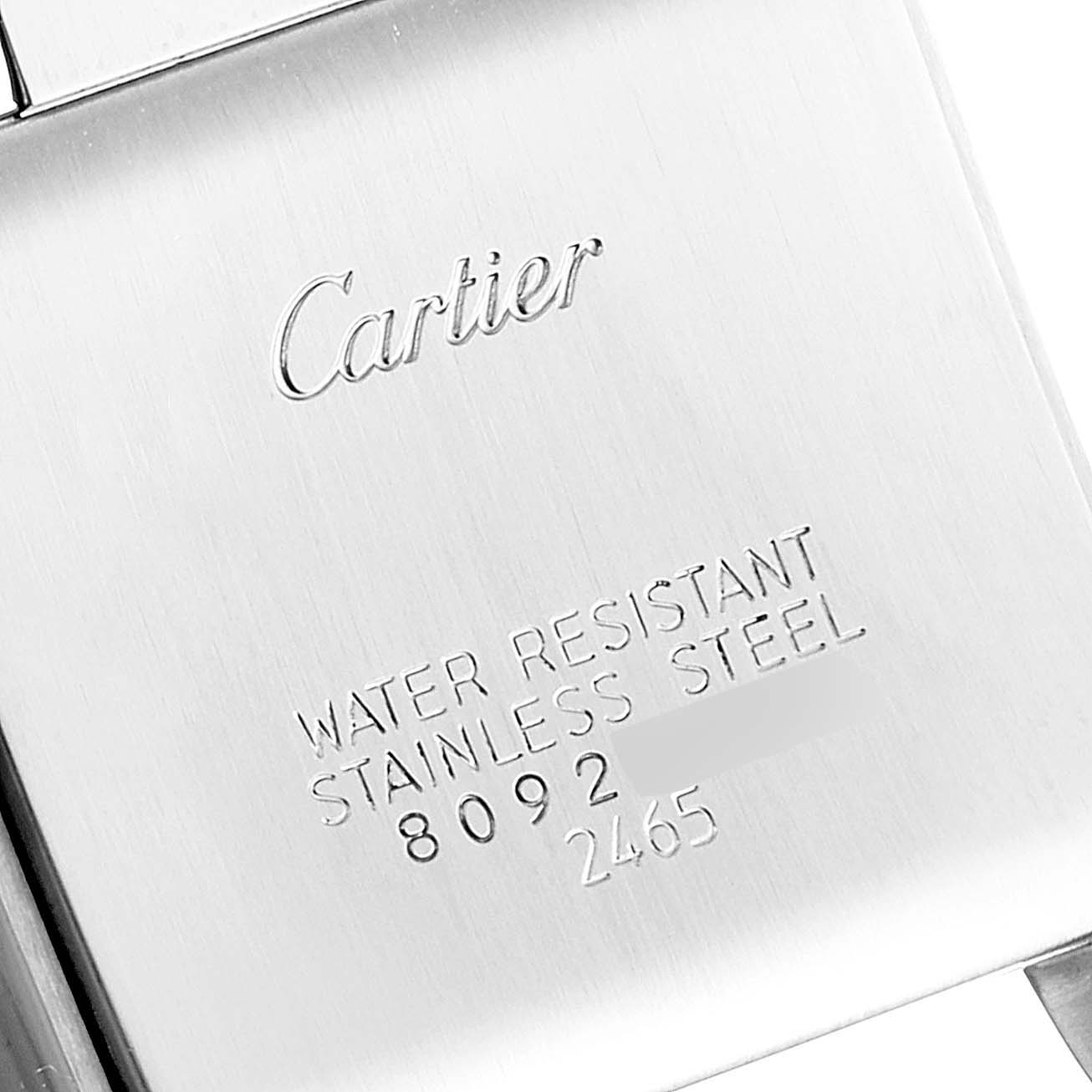 This image shows the back of a Cartier Tank Francaise W51012Q4 Women's Steel and Gold (two tone) Silver Dial W51012Q4 Women's Steel and Gold (two tone) Silver Dial watch, with engravings indicating water resistance and stainless steel material.