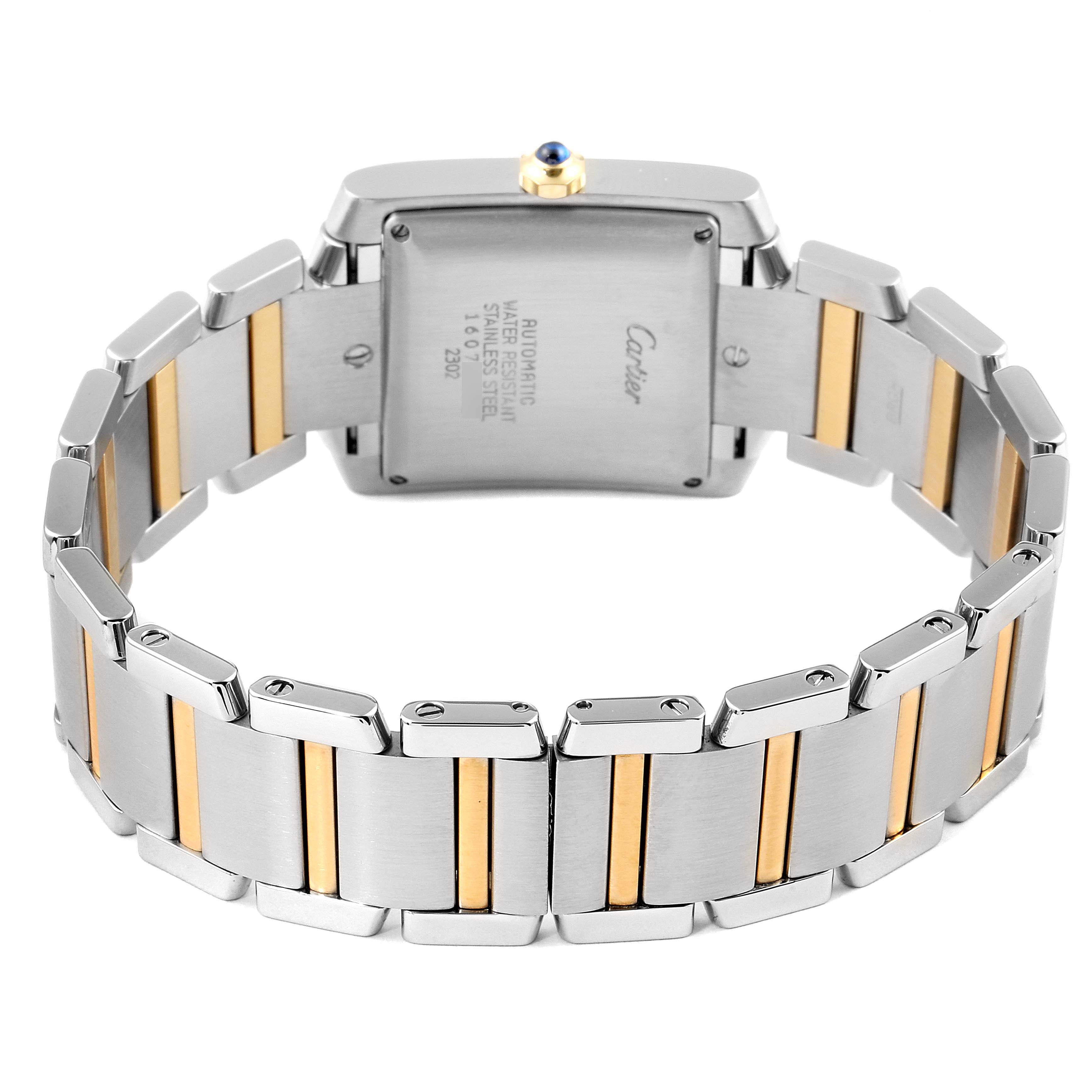 The image shows the back view of the Cartier W51005Q4 Men's Steel and Gold (two tone) Silver Dial W51005Q4 Men's Steel and Gold (two tone) Silver Dial Tank Francaise Steel Yellow Gold Large Unisex Watch W51005Q4, highlighting its bracelet and case.