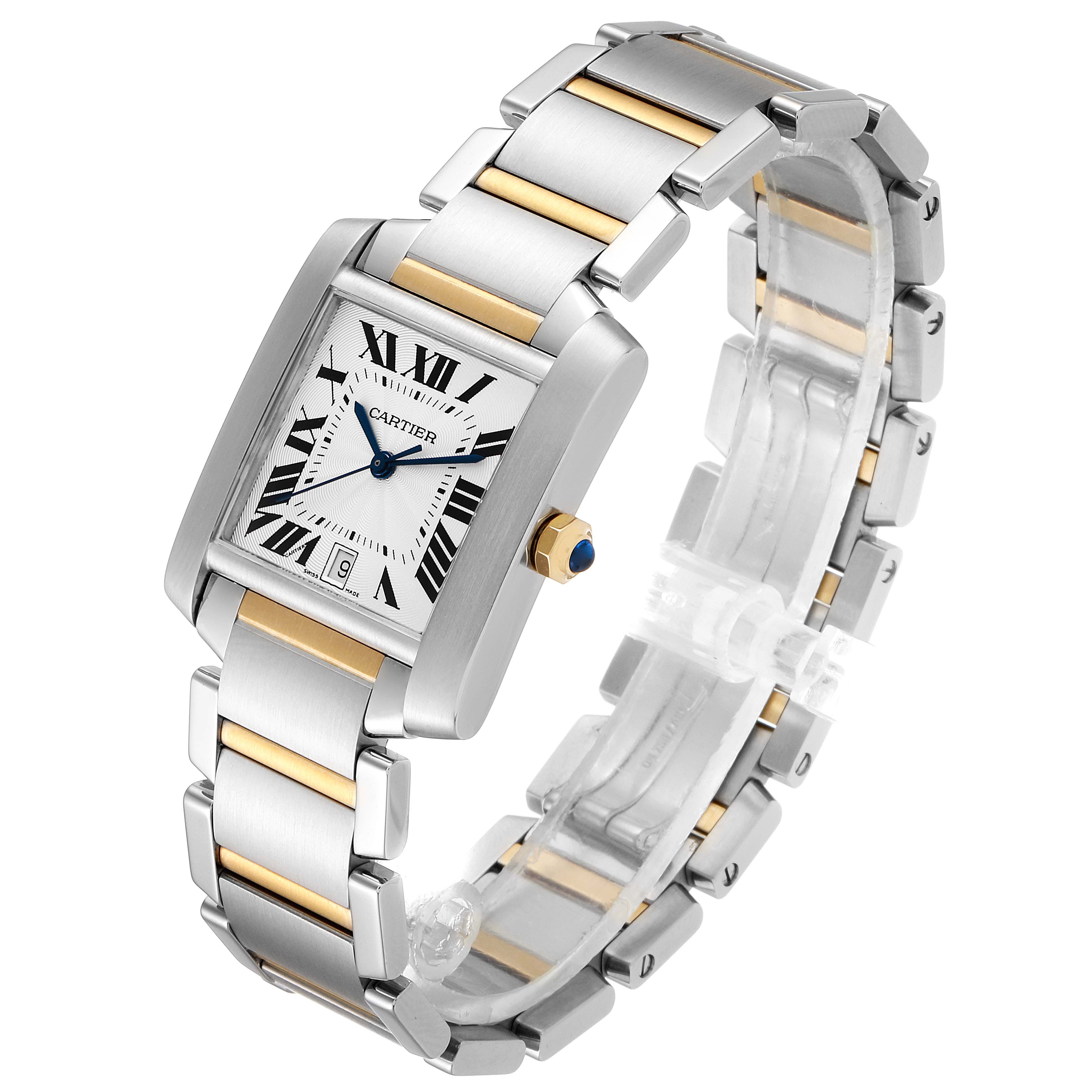 The Cartier W51005Q4 Men's Steel and Gold (two tone) Silver Dial W51005Q4 Men's Steel and Gold (two tone) Silver Dial Tank Francaise Steel Yellow Gold Large Unisex Watch W51005Q4 is shown at an angle displaying the face, bracelet, and crown.