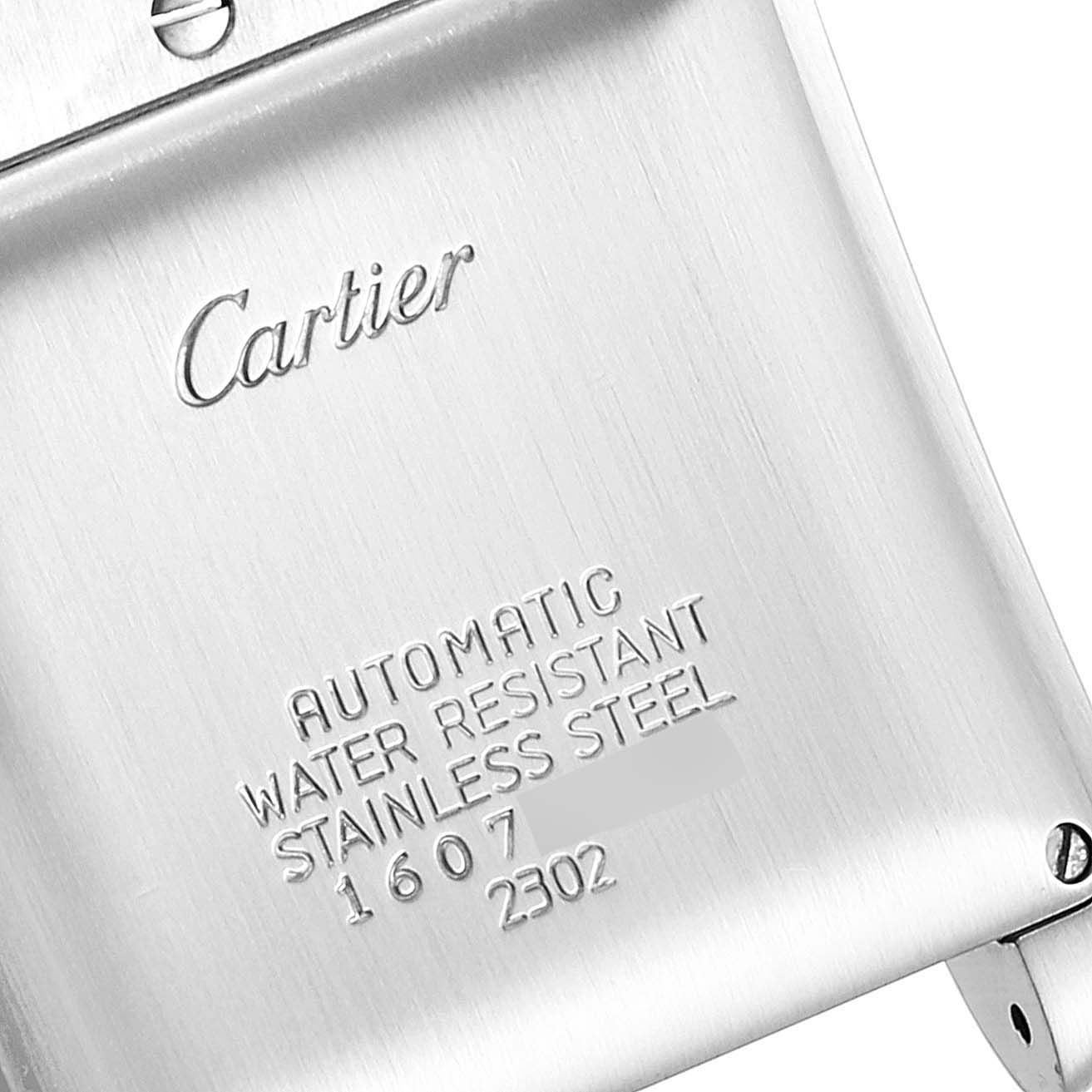 This image shows the engraved back case of the Cartier W51005Q4 Men's Steel and Gold (two tone) Silver Dial W51005Q4 Men's Steel and Gold (two tone) Silver Dial Tank Francaise Steel Yellow Gold Large Unisex Watch W51005Q4.