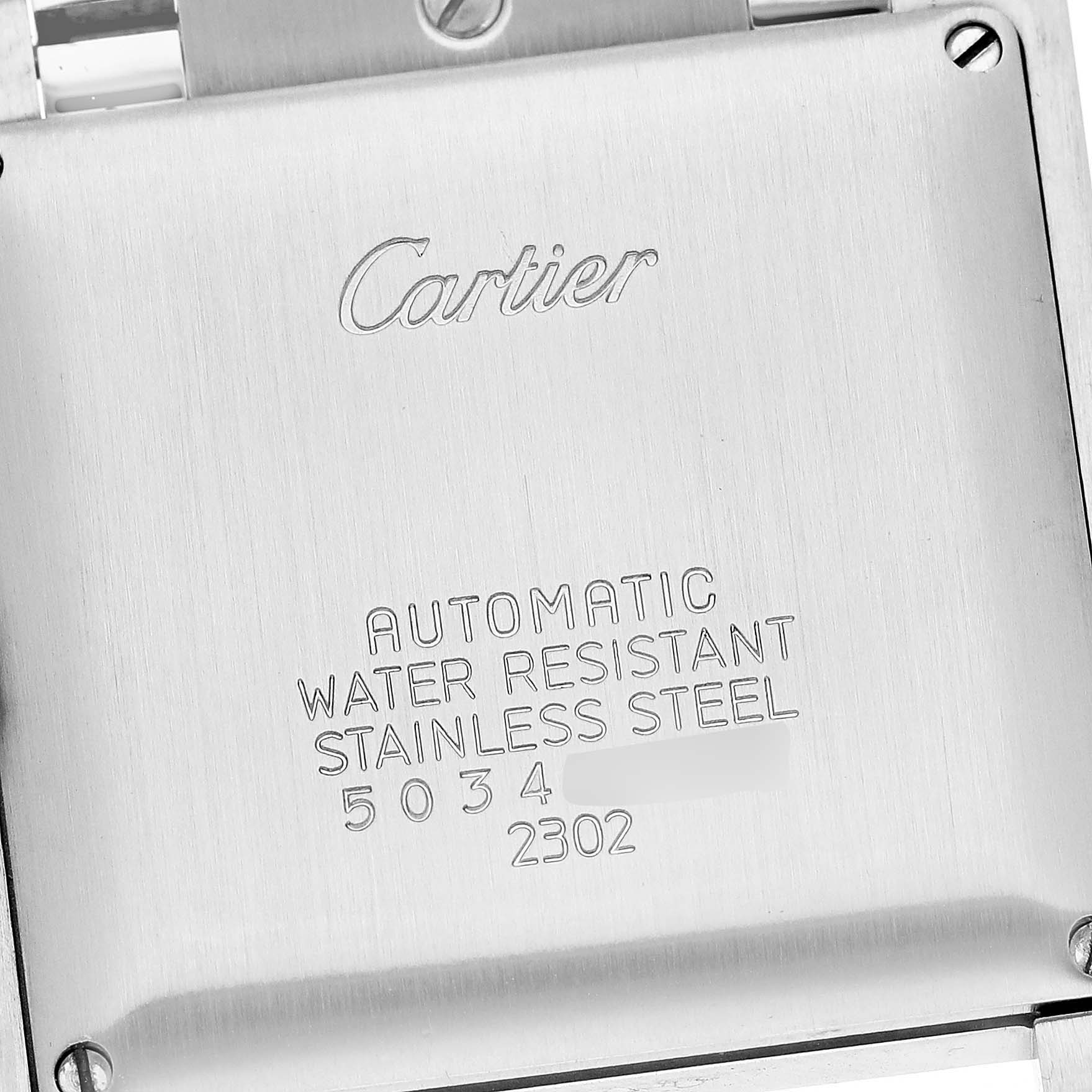 The image shows the case back of a Cartier Tank Francaise W51005Q4 Men's Steel and Gold (two tone) Silver Dial W51005Q4 Men's Steel and Gold (two tone) Silver Dial watch, displaying branding and specifications.