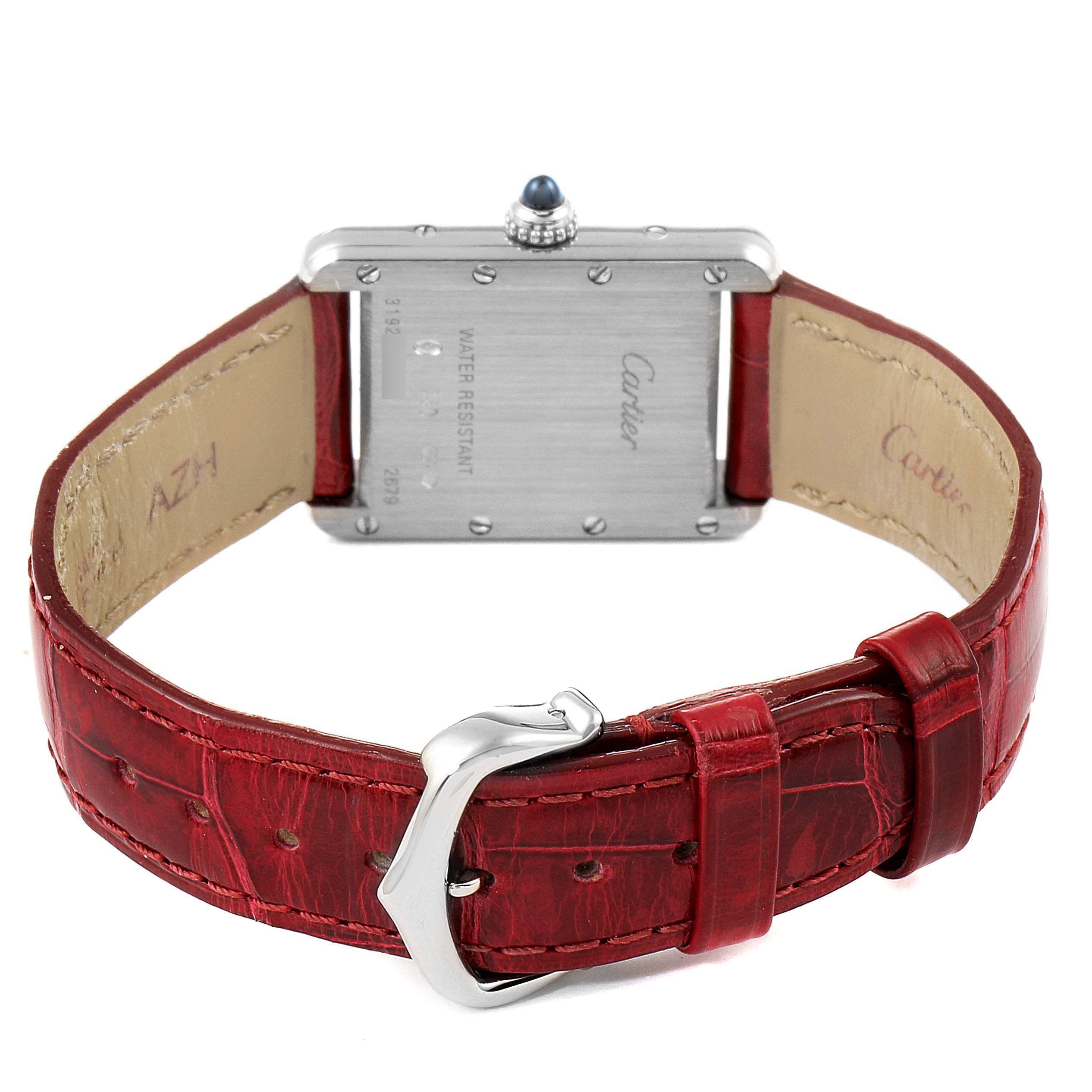 The image shows the back view of a Cartier Tank Louis W1541056 Women's White Gold Silver Dial W1541056 Women's White Gold Silver Dial watch with a red leather strap and visible clasp.