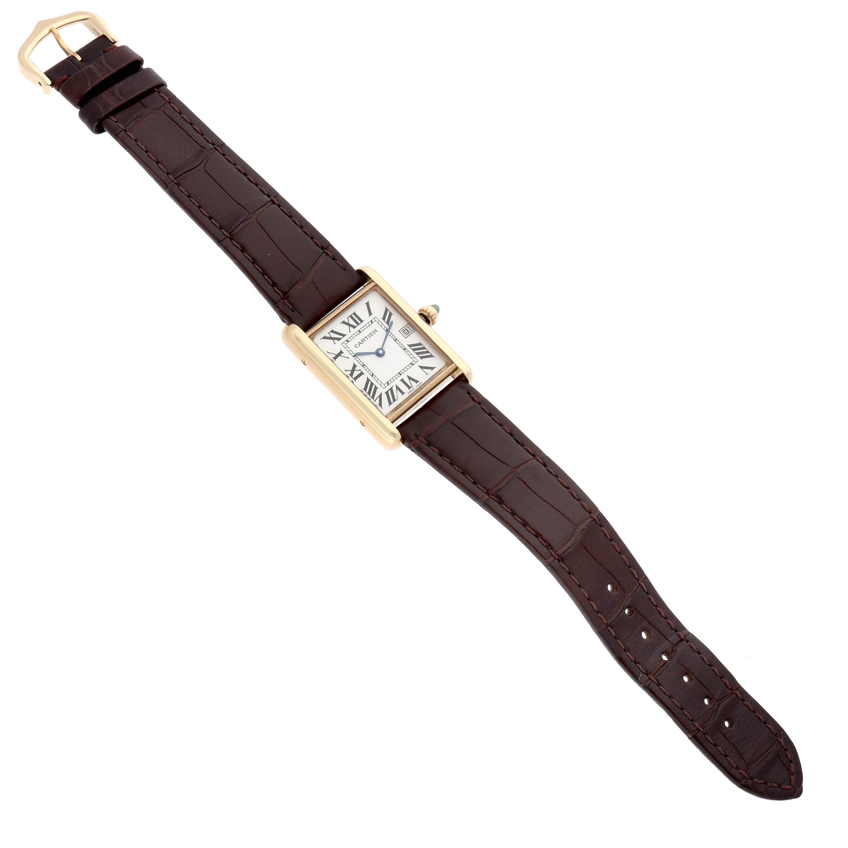 The image shows a Cartier Tank Louis W1529756 Men's Yellow Gold Silver Dial watch from a top-down angle, highlighting its rectangular face and brown leather strap.