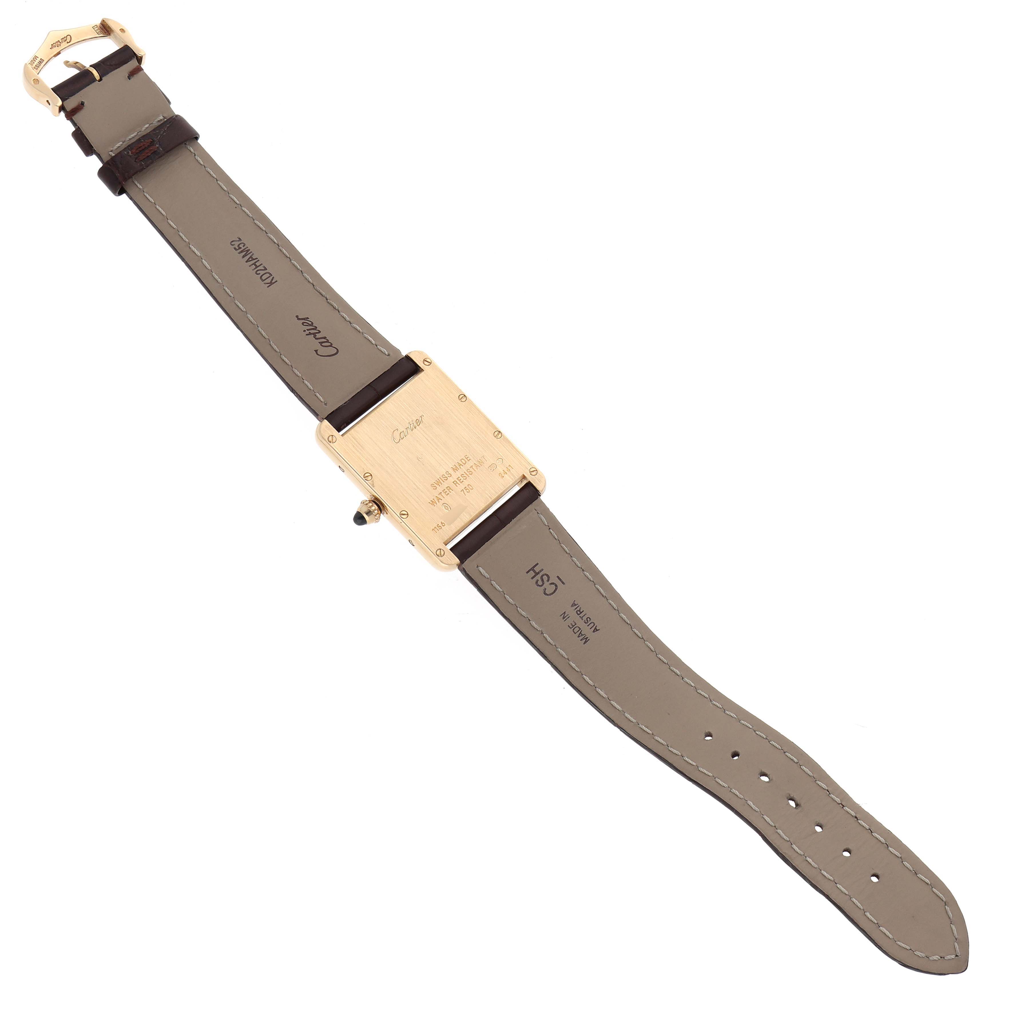 The image shows a Tank Louis model by Cartier from the back, highlighting the case back, strap, and buckle.