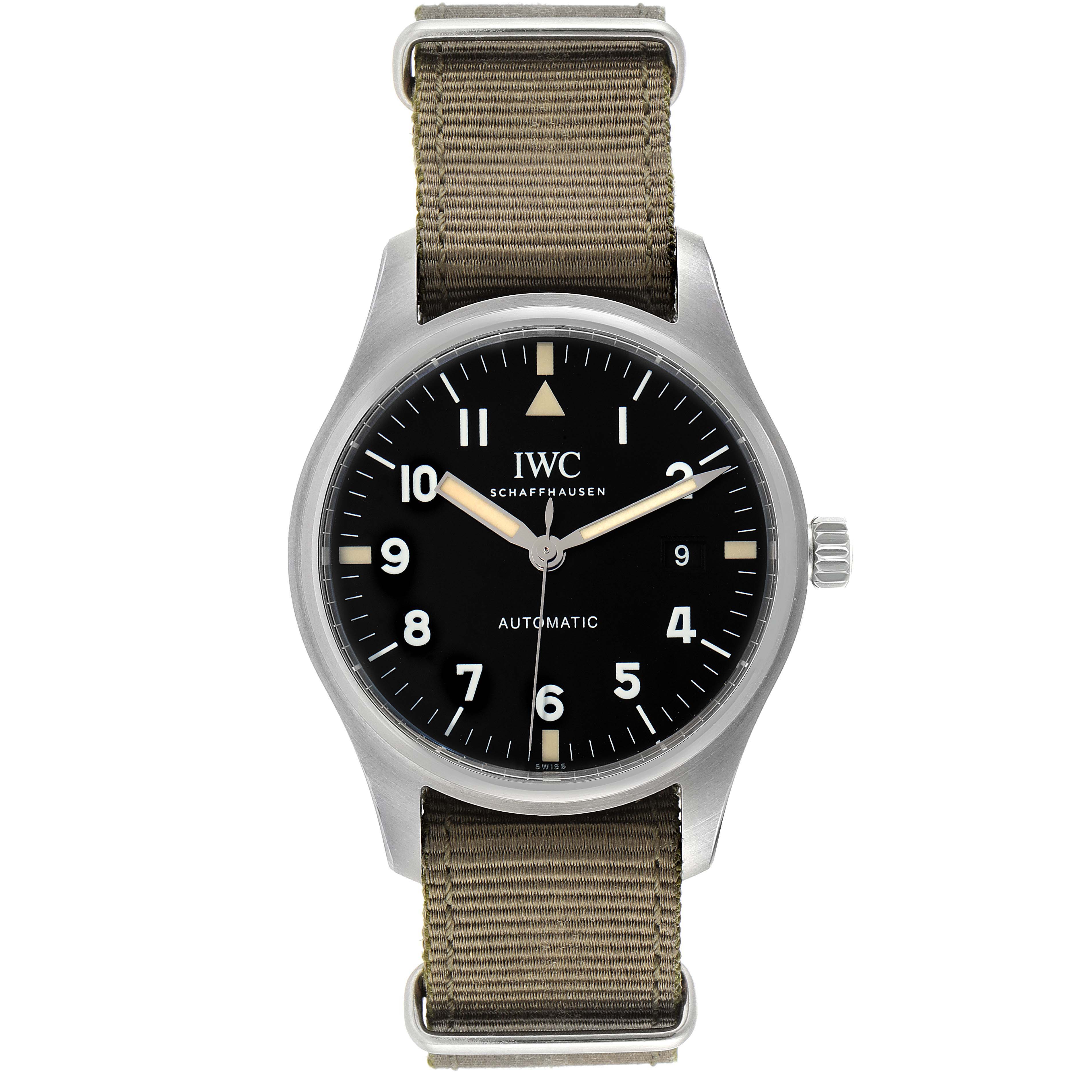 This IWC Pilot IW327007 Men's Stainless Steel Black Dial IW327007 Men's Stainless Steel Black Dial model watch is shown from a front angle, displaying the dial, hands, crown, and fabric strap.