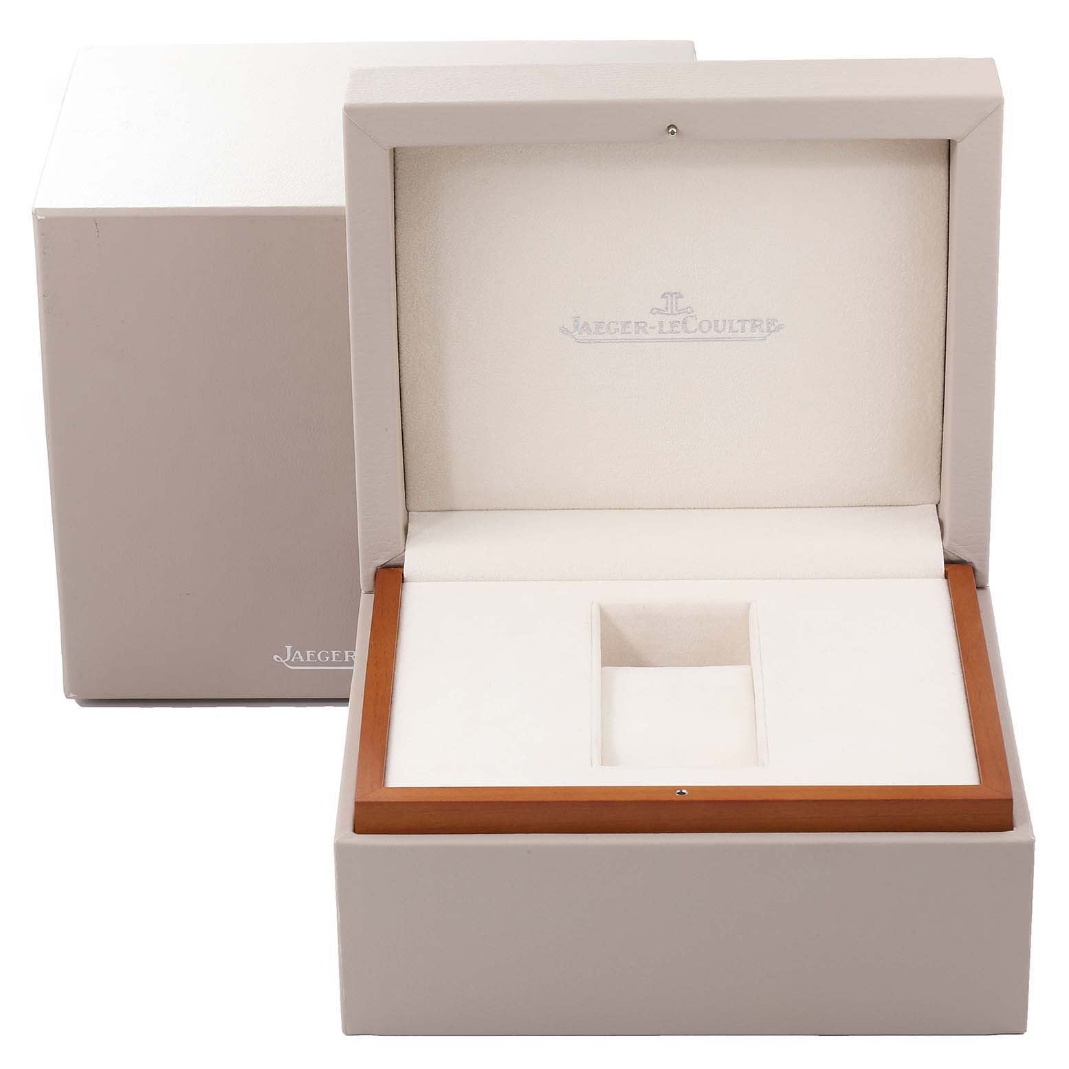 The image shows an open Jaeger-LeCoultre Reverso watch box, displaying its inner compartment and lid.